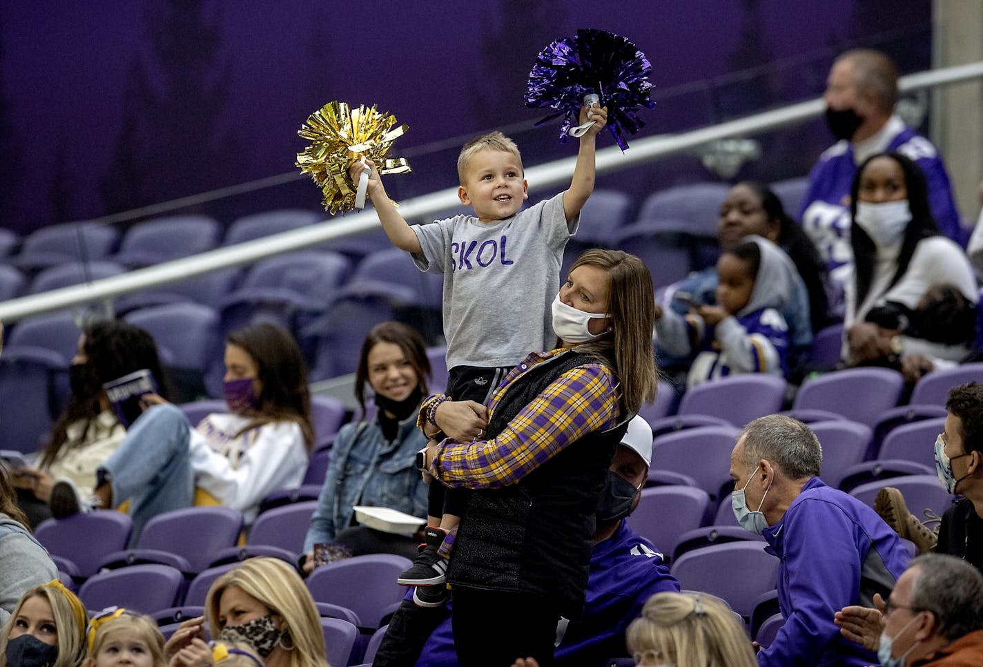 A small Minnesota Vikings fan celebrated Adam Thielen's touchdown during the fourth quarter Oct. 18.