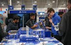 Shoppers looked for deals on PS4 and Xbox at the Richfield Best Buy store just after it opened at 5 p.m. Thursday. Nov. 28.