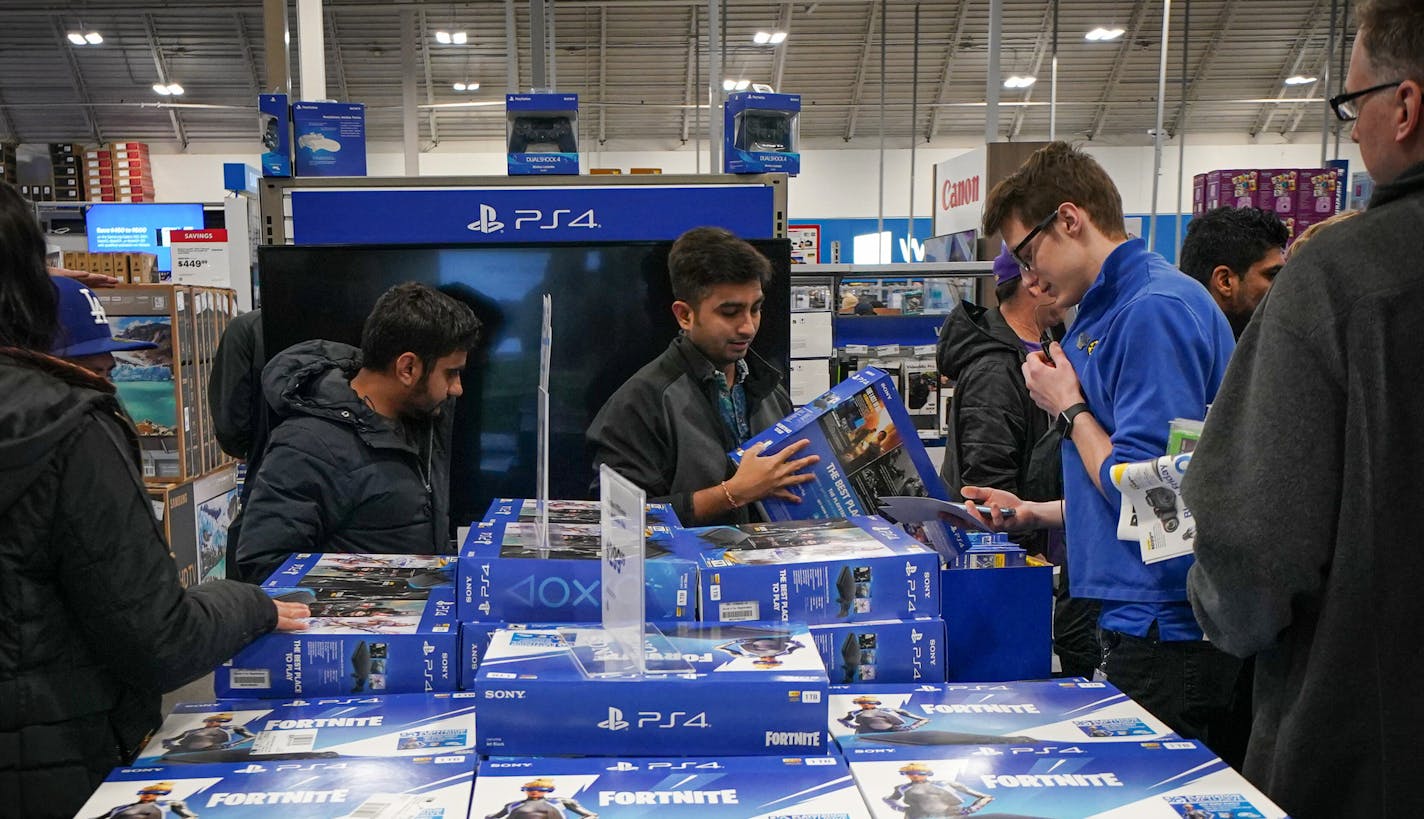 Shoppers looked for deals on PS4 and Xbox at the Richfield Best Buy store just after it opened at 5 p.m. Thursday. Nov. 28.