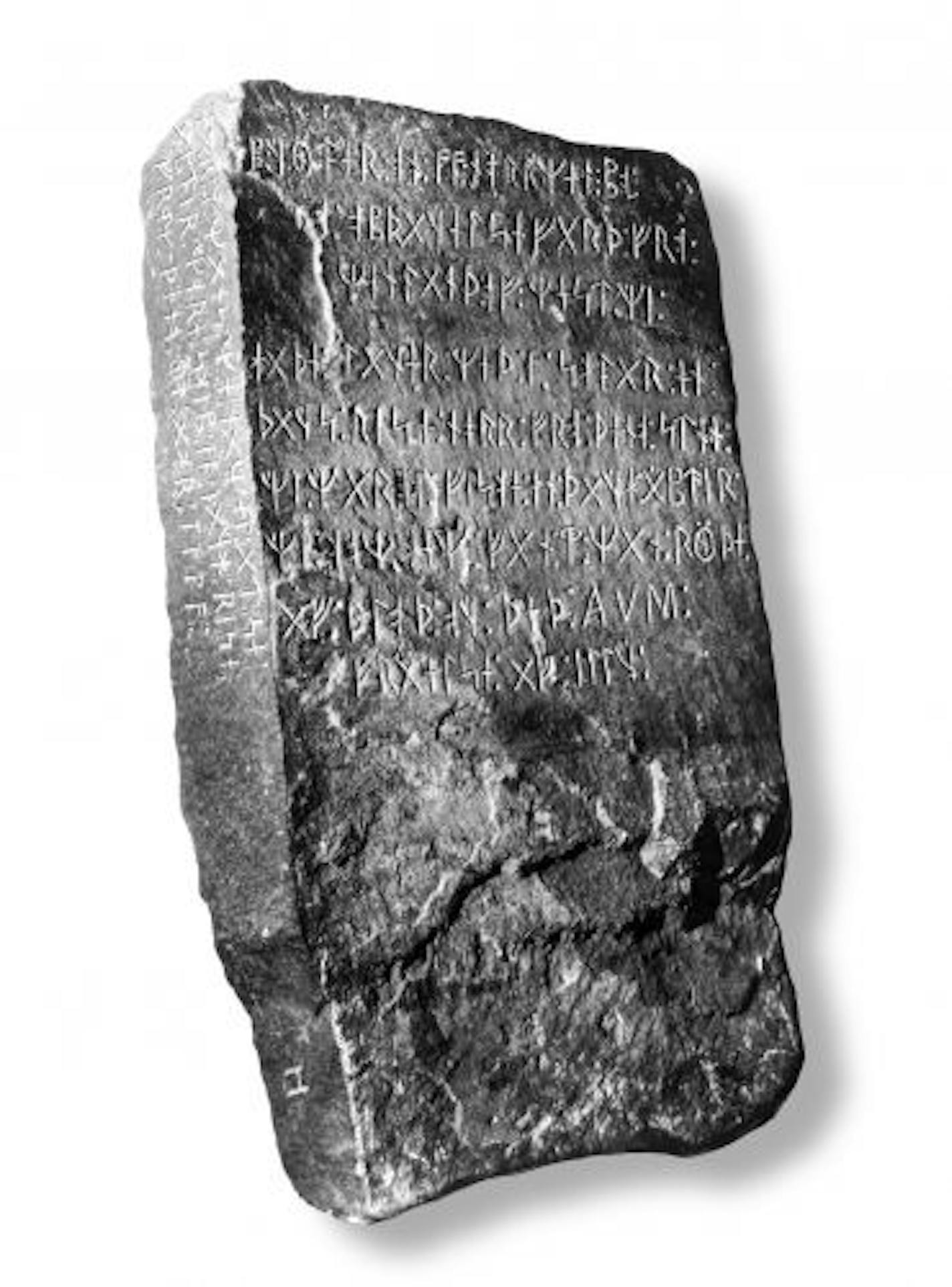 Shown is the Kensington Runestone. Olof Ohman said he found the buried stone on his Minnesota farm. Others say he carved it about 1898 as a joke.