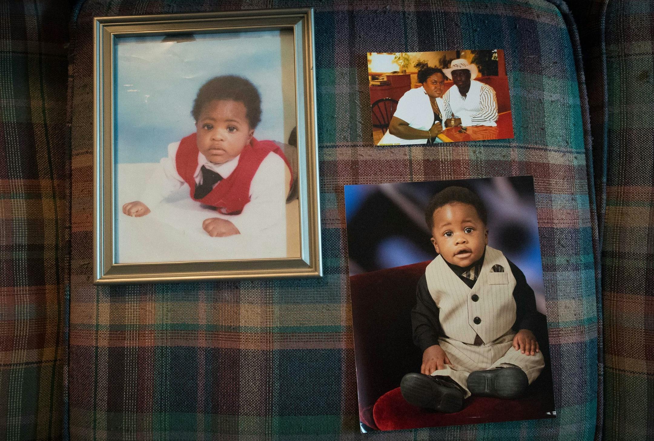 Jacob Mayson, left, now 8, Benzel Mayson, 2, and a photo of their mother and father Jacob and Bernice Mayson. The younger Jacob, Benzel and Bernice are all currently stuck in Liberia after the Nigerian airline they book suspended air travel as a result of the Ebola outbreak. ] AARON LAVINSKY • aaron.lavinsky@startribune.com Jacob Mayson has been working to get his fiancé and two children home safely from Liberia after they were stranded as a result of the Ebola outbreak in July. Maso