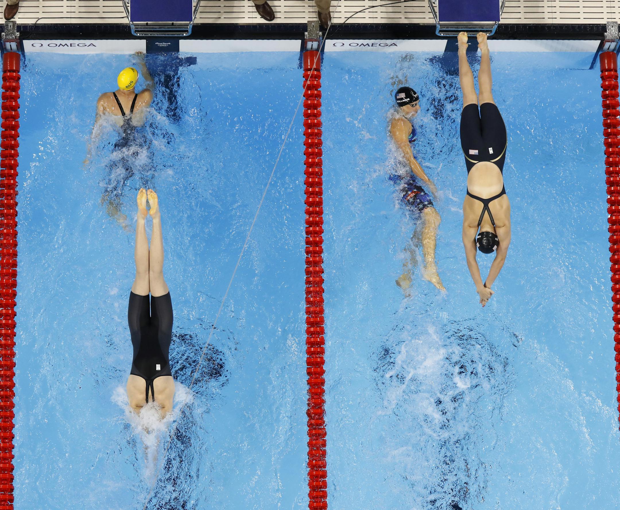 Australia's Cate Campbell starts her final leg of the 4 x 100m freestyle championship final swimming competition ahead of USA's Katie Ledecky at the 2016 Summer Olympics, Saturday, Aug. 6, 2016, in Rio de Janeiro, Brazil. (AP Photo/Morry Gash) ORG XMIT: OLMG130