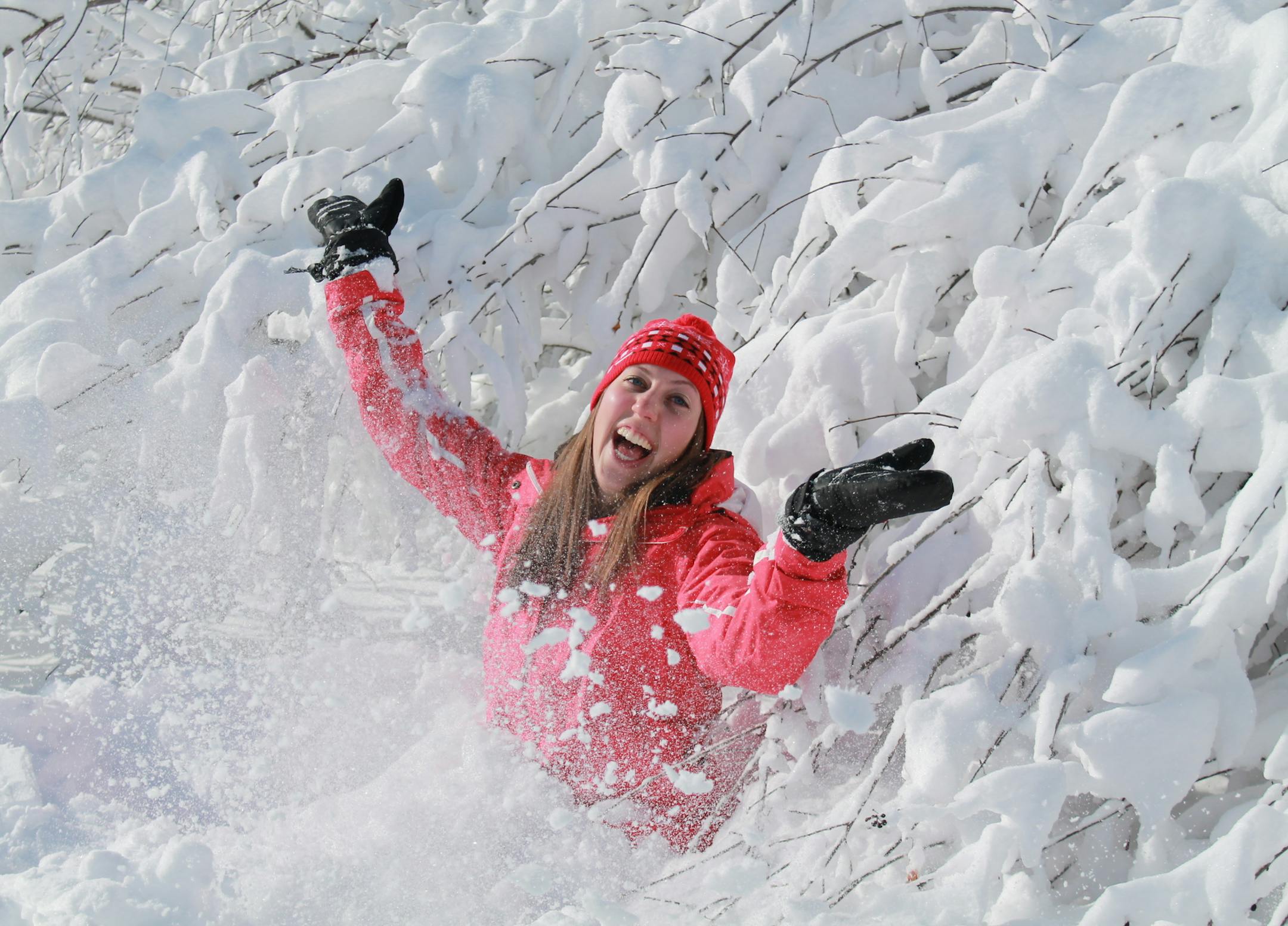 In "No School Snow Day," the sister of the photographer plays in a new snowfall in Chisago County.