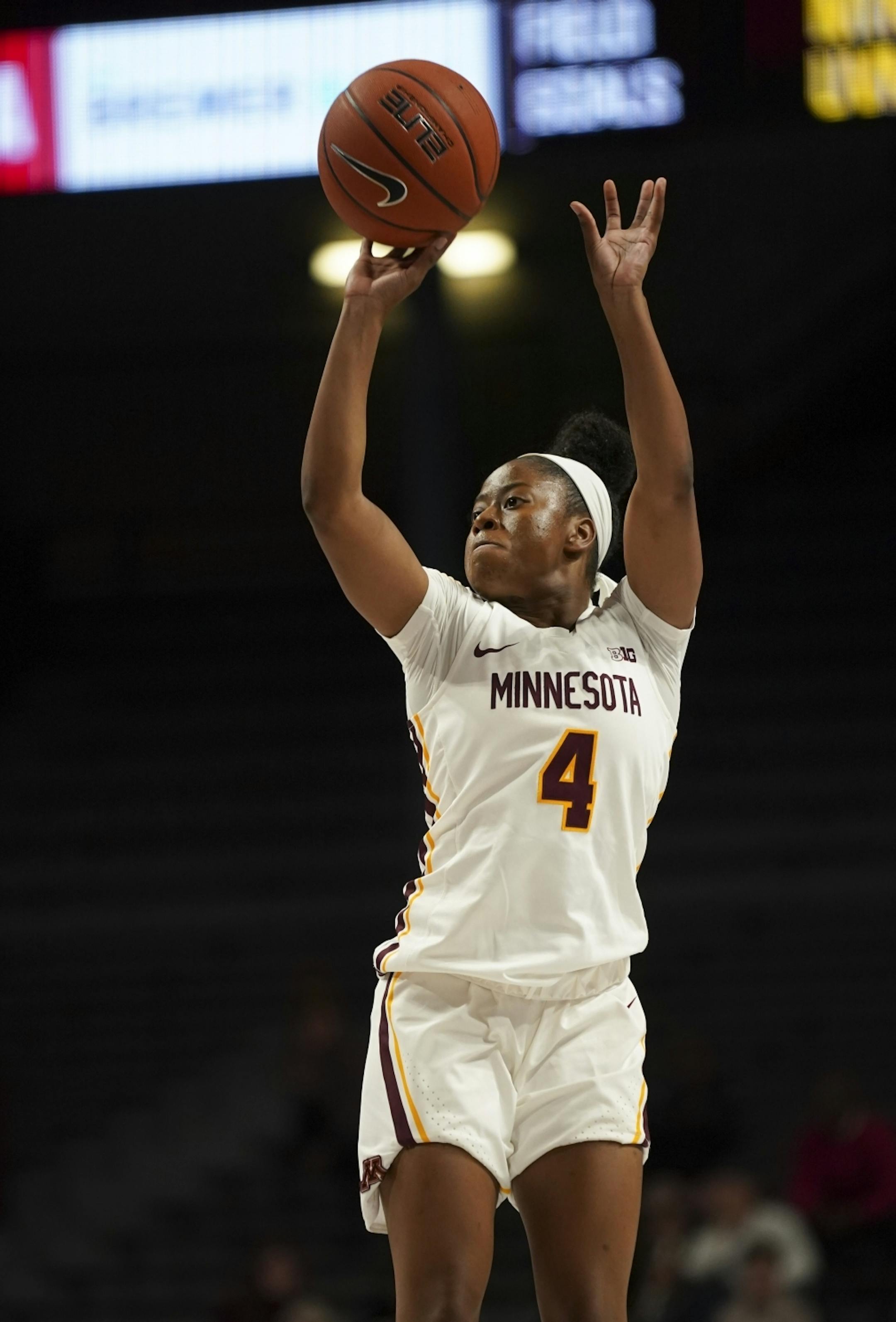 Minnesota Golden Gophers guard Jasmine Powell (4) shot in the fourth quarter. She led the Gophers with 19 points.