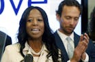 Surrounded by her family, Rep. Mia Love, R-Utah, talks about election results in the 4th Congressional District at the Utah Republican Party headquart