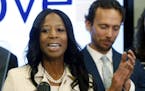 Surrounded by her family, Rep. Mia Love, R-Utah, talks about election results in the 4th Congressional District at the Utah Republican Party headquart