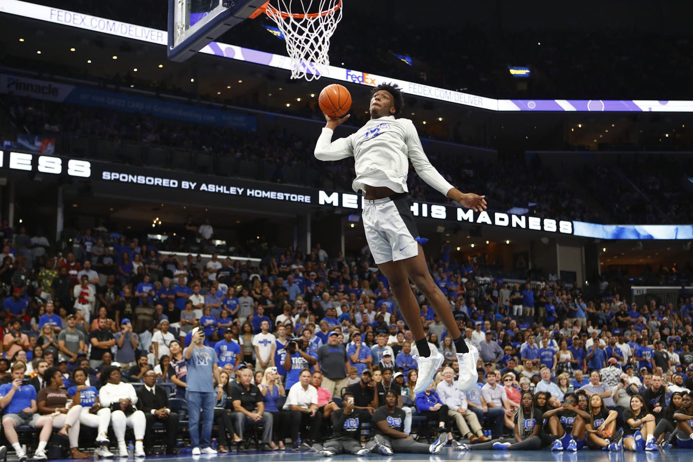 FILE - In this Oct. 3, 2019, file photo, Memphis freshman center James Wiseman dunks the ball during Memphis Madness in Memphis, Tenn. Wiseman headlines the nation&#x2019;s top recruiting class at Memphis, but he isn&#x2019;t the only first-year player that figures to make an impact this season. (Joe Rondone/The Commercial Appeal via AP, File) ORG XMIT: TNMEM501