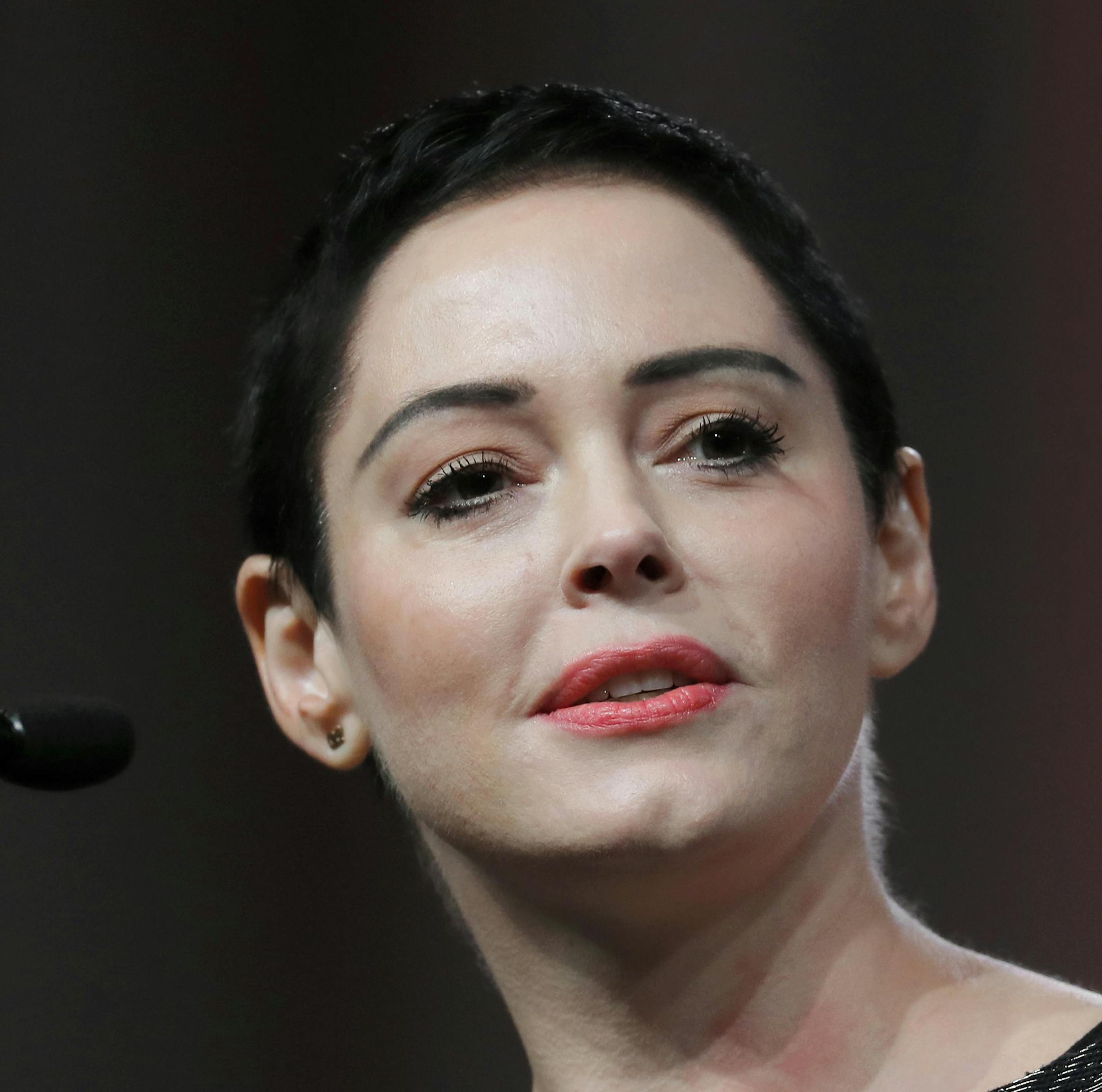 FILE- In this Oct. 27, 2017, file photo, actress Rose McGowan speaks at the inaugural Women's Convention in Detroit. A judge is scheduled to hear evidence on whether a drug possession charge in Virginia against McGowan should go forward. McGowan is seeking to have the charges against her dismissed. She has suggested the drugs may have been planted by agents hired by disgraced Hollywood producer Harvey Weinstein. (AP Photo/Paul Sancya, File)