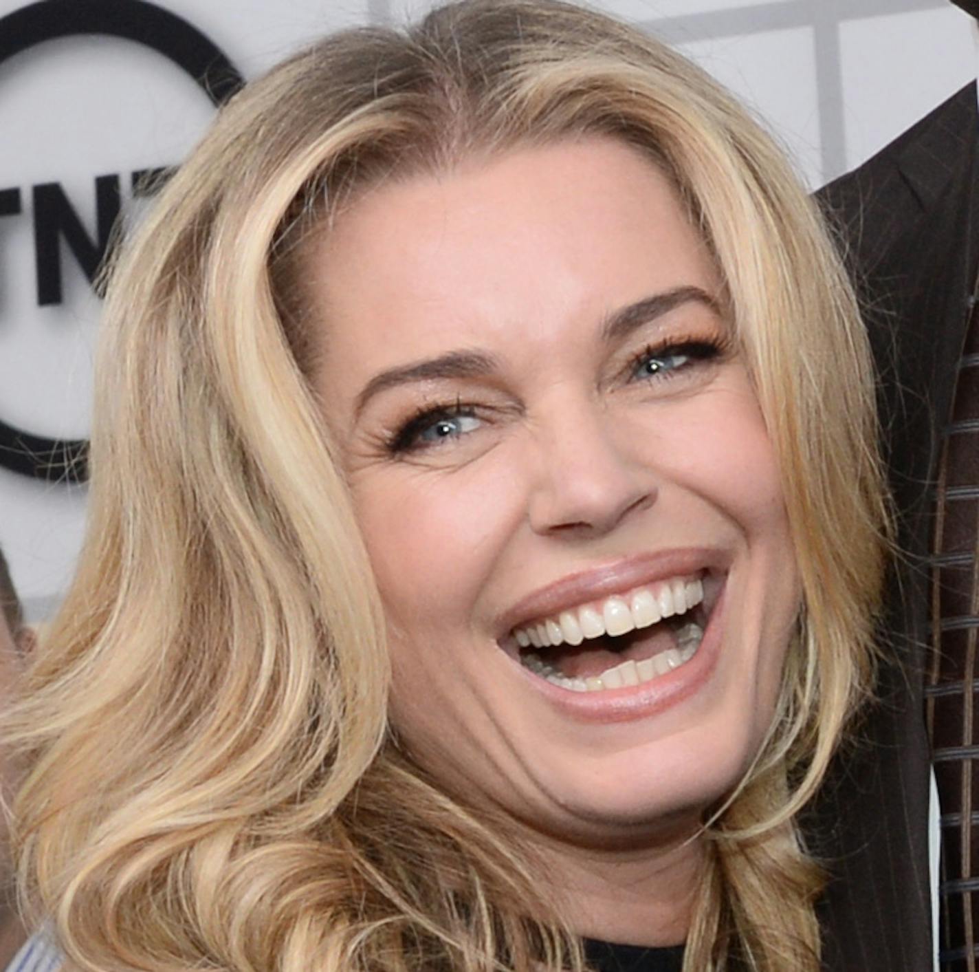 Actress Rebecca Romijn, left, and sports commentator Shaquille O'Neal attends the Turner Network 2015 Upfront at Madison Square Garden on Wednesday, May 13, 2015, in New York. (Photo by Evan Agostini/Invision/AP) ORG XMIT: MIN2015052716441860