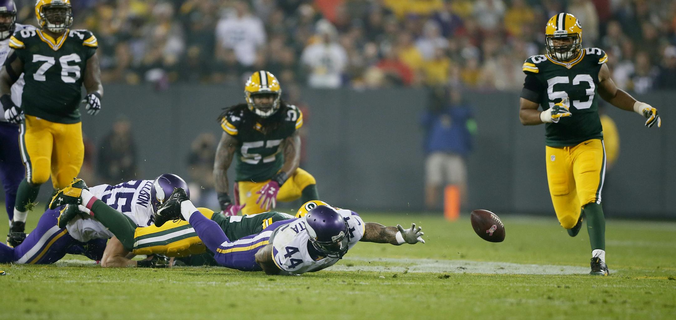 Minnesota Vikings running back Matt Asiata (44) fumble the football in the second quarter, the ball was recovered by Green Bay Packers cornerback Casey Hayward (29). The Minnesota Vikings played the Green Bay Packers Thursday October 2 , 2014 at Lambeau Field in Green Bay ,WI. ] Jerry Holt Jerry.holt@startribune.com