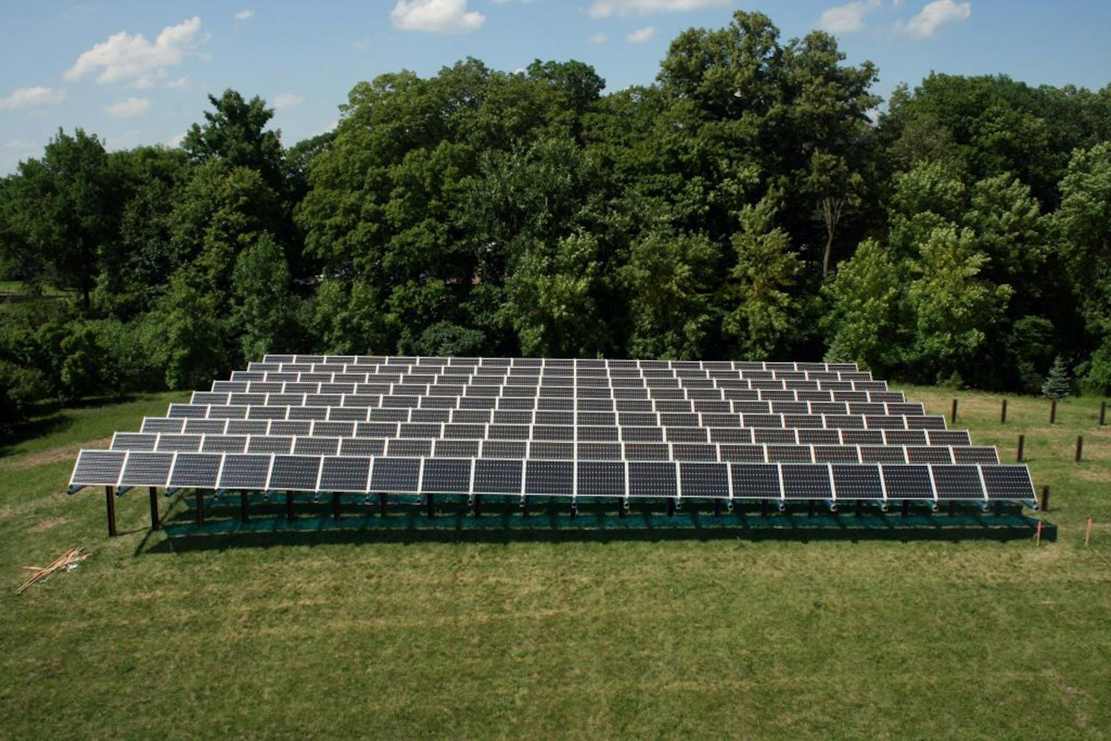 Xcel plans to build more solar arrays like this one, the first community solar array in Minnesota, which was set up in Rockford earlier this year by the Wright Hennepin Cooperative Electric Association.