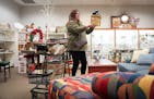 Long-time shopper Sandy Solberg checked out the offerings at Resale Select thrift store Tuesday, Oct. 24, 2023 Plymouth, Minn. ] GLEN STUBBE • glen.