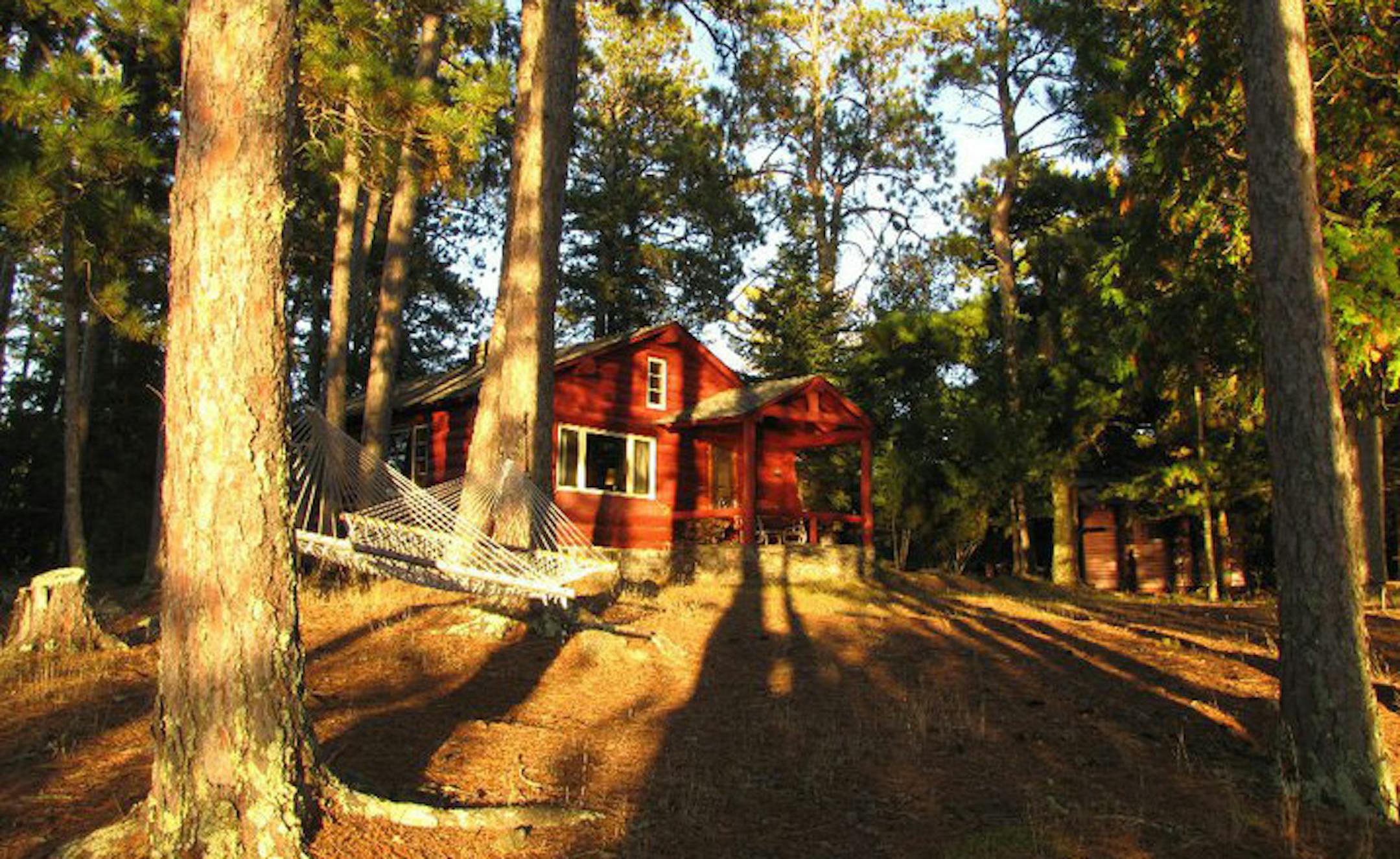 Peluso’s cabin gathers the setting sun on Lake Vermilion.