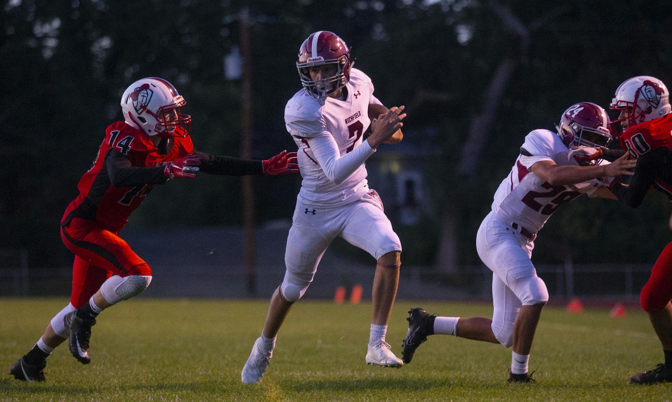 Richfield quarter back Ryan Miles (7) ran in a touchdown in the second half of Friday night's game.]
ALEX KORMANN • alex.kormann@startribune.com St. Croix Lutheran High School opened their home season against Richfield in St. Paul on Friday August 30, 2019.