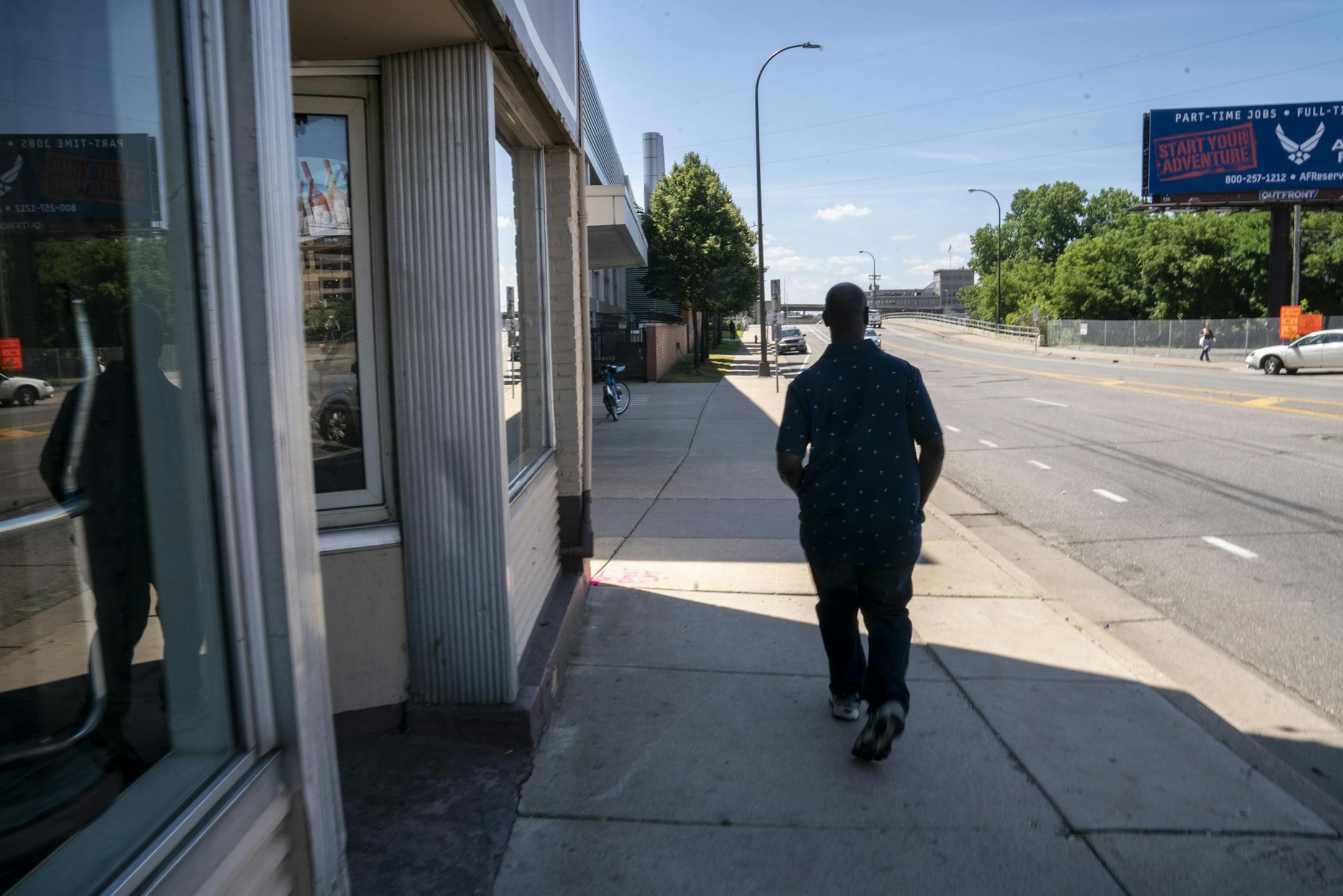 Tim Walker walked past a closed down Liquor Lyles on Glendale Avenue towards the bridge that will be shutting down on July 15 for construction in Minneapolis, Minn. Thursday, July 11, 2019. Walker, who said he sometimes finds himself homeless, says he uses the bridge to get around regularly. ] RENEE JONES SCHNEIDER ¥ renee.jones@startribune.com Council Member Lisa Goodman says the Met Council is unnecessarily closing a main connecting bridge from North Minneapolis to the rest of the city fo