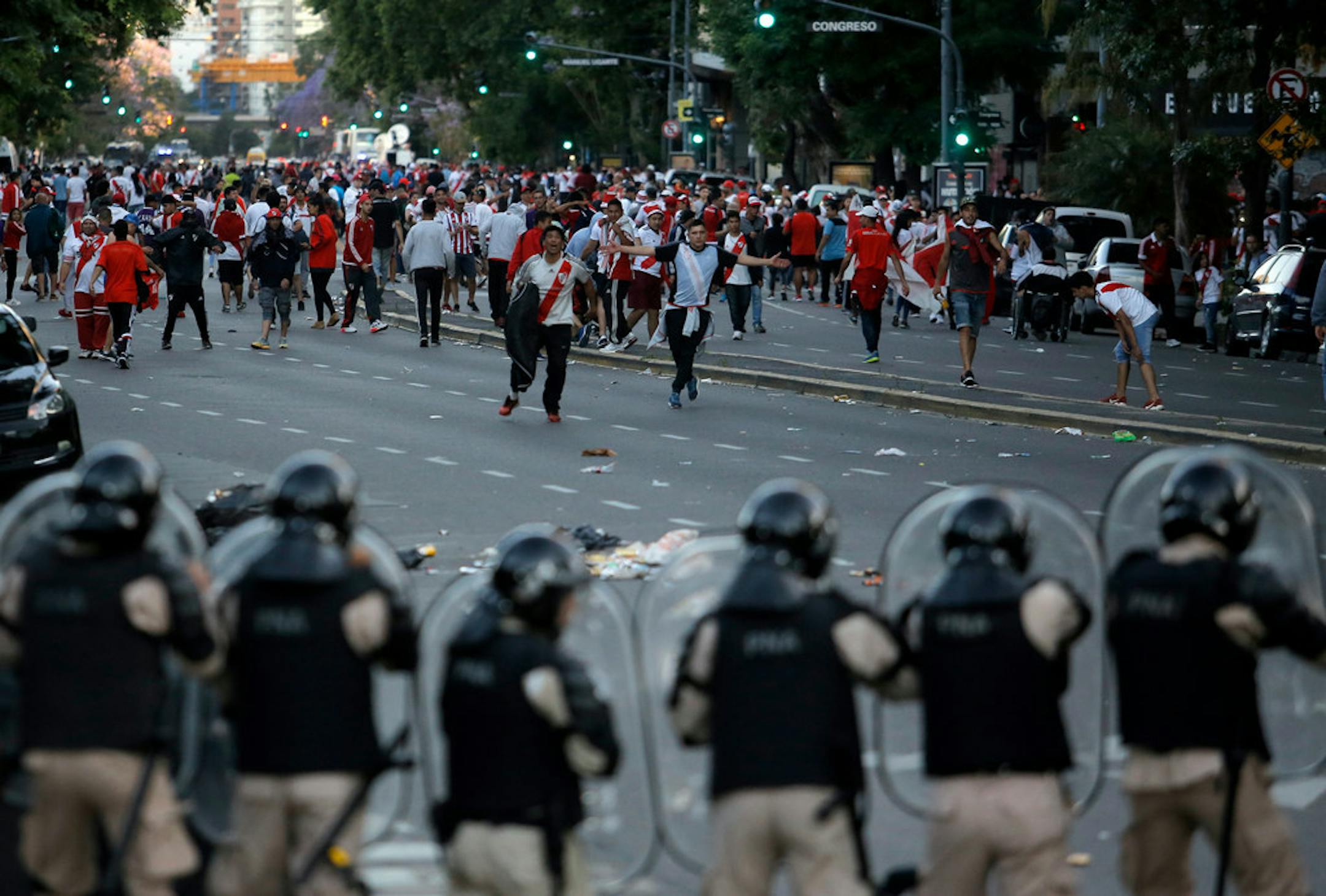 Argentina River Plate fans clashed with riot police outside the Antonio Vespucio Liberti stadium in Buenos Aires on Nov. 24 before a scheduled soccer match between River Plate and Boca Juniors. The bus carrying the Boca Juniors players was attacked by River Plate fans, injuring several players.