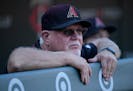 Arizona Diamondbacks bench coach and former Twins manager Ron Gardenhire (35) watched Michael Cuddyer's Twins Hall of Fame induction ceremony before t