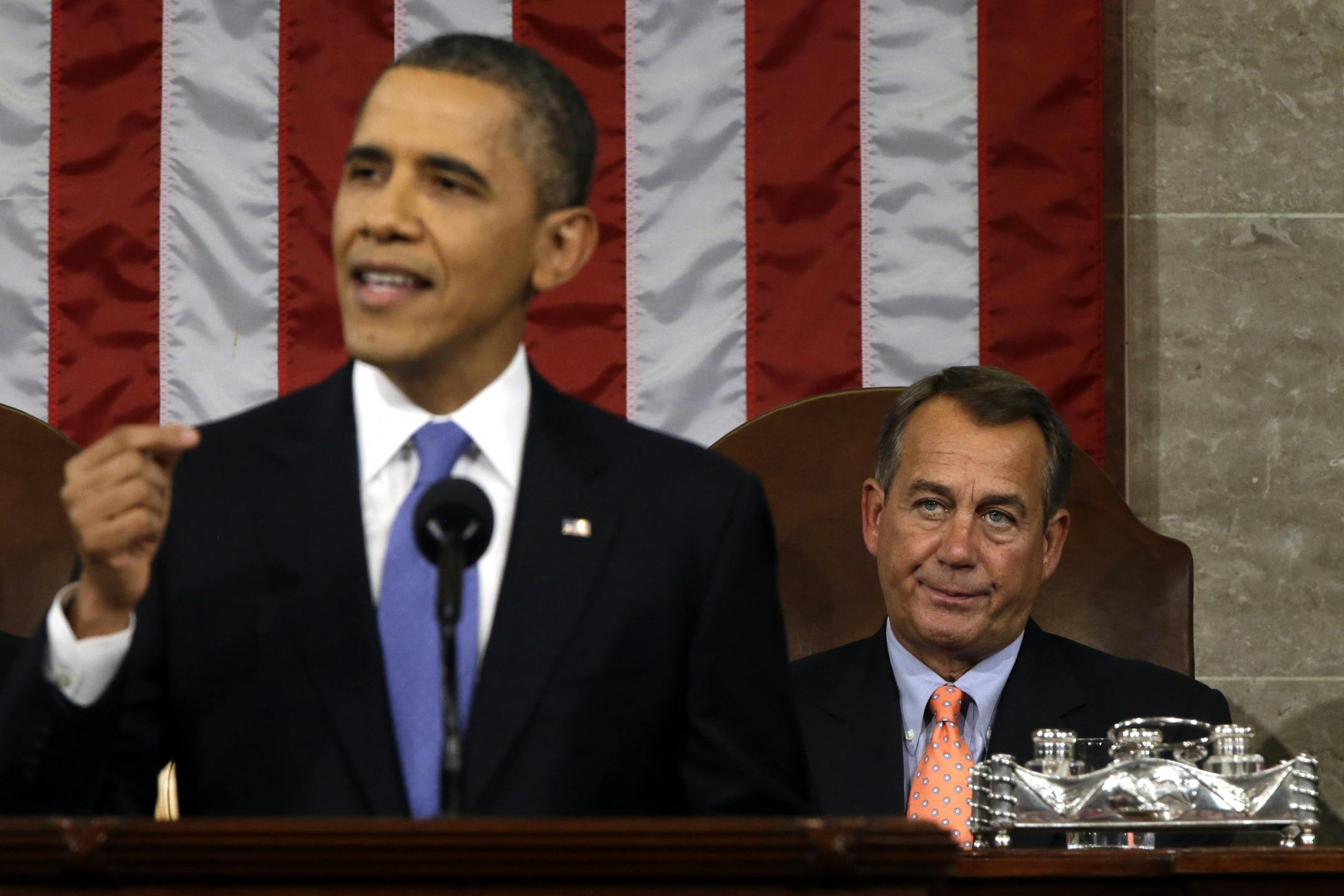 House Speaker John Boehner of Ohio listens at right as President Barack Obama gives his State of the Union address during a joint session of Congress on Capitol Hill in Washington, Tuesday Feb. 12, 2013.