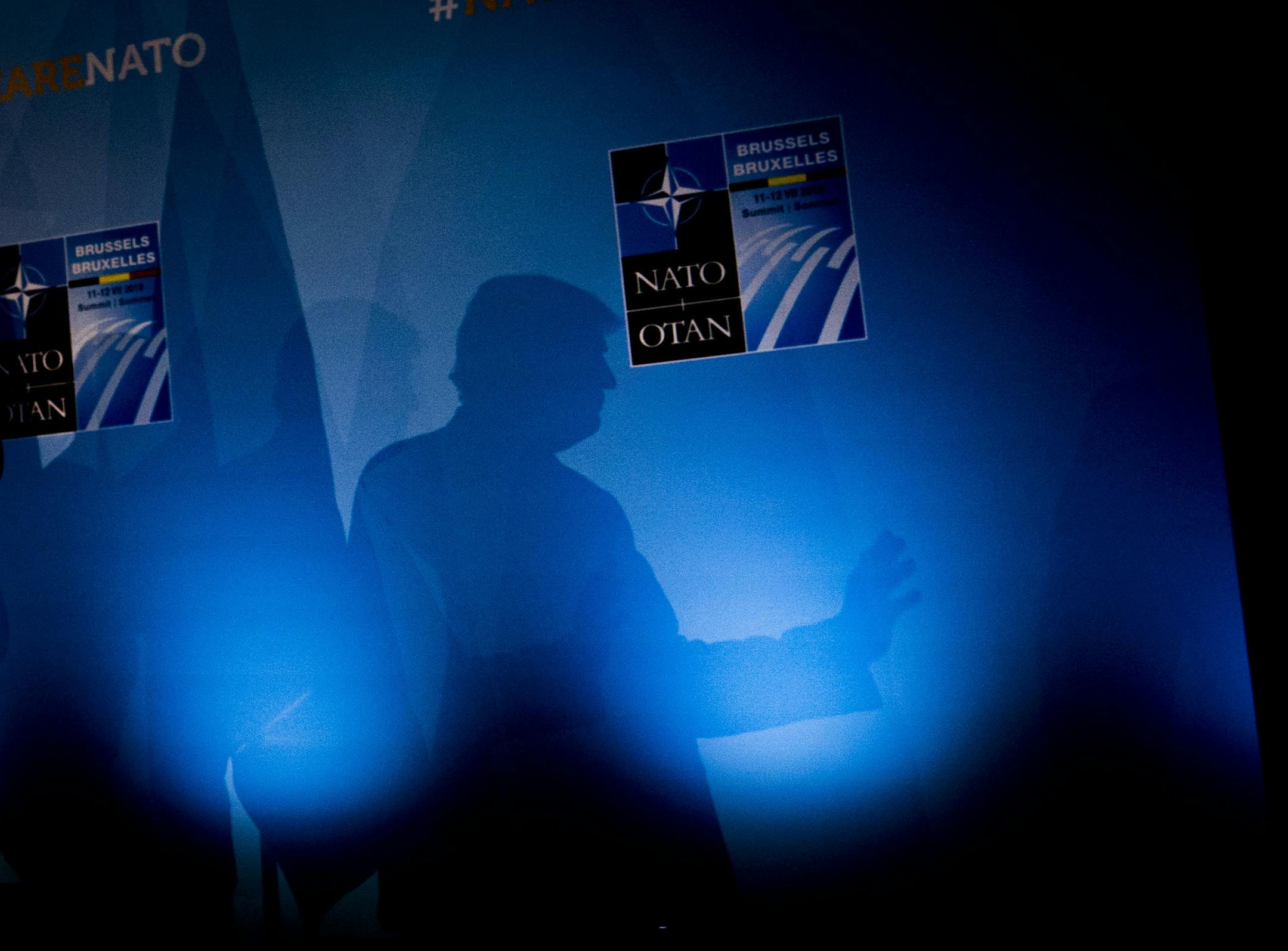 President Donald Trump casts a shadow on a wall at a news conference following the NATO summit in Brussels on Thursday, July 12, 2018. Trump strongly recommitted American support for the alliance on Thursday, declaring, ìI believe in NATO.î (Doug Mills/The New York Times)