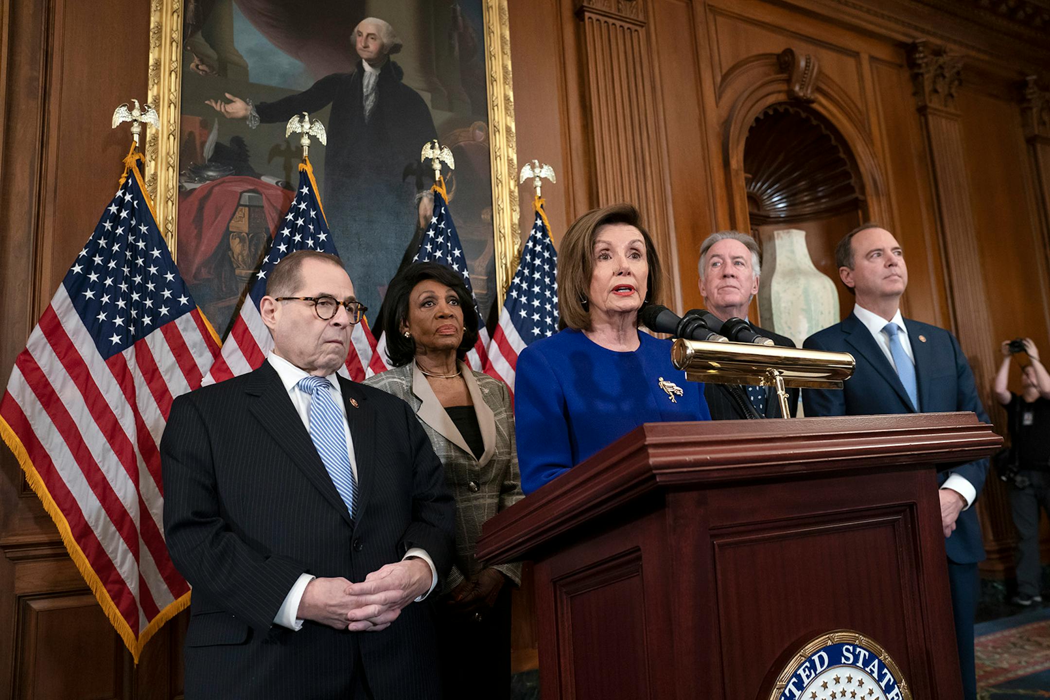 Speaker of the House Nancy Pelosi, D-Calif., joined from left by House Judiciary Committee Chairman Jerrold Nadler, D-N.Y., House Financial Services Committee Chairwoman Maxine Waters, D-Calif., House Ways and Means Committee Chairman Richard Neal, D-Mass., and House Intelligence Committee Chairman Adam Schiff, D-Calif., unveils articles of impeachment against President Donald Trump, abuse of power and obstruction of Congress, at the Capitol in Washington, Tuesday, Dec. 10, 2019. (AP Photo/J. Sc