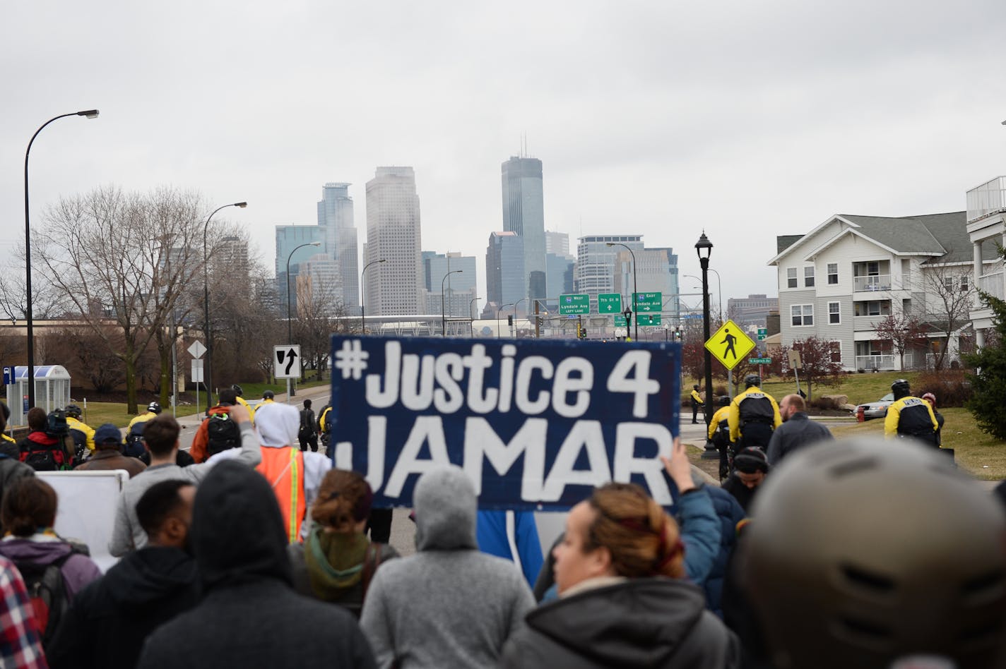 Protesters march toward the Hennepin County Governtment Center in Minneapolis Wednesday March 30, 2016. Evening marches and protests began in Minneapolis following the announcement that there will be no charges against Minneapolis police officers in the shooting death of Jamar Clark.