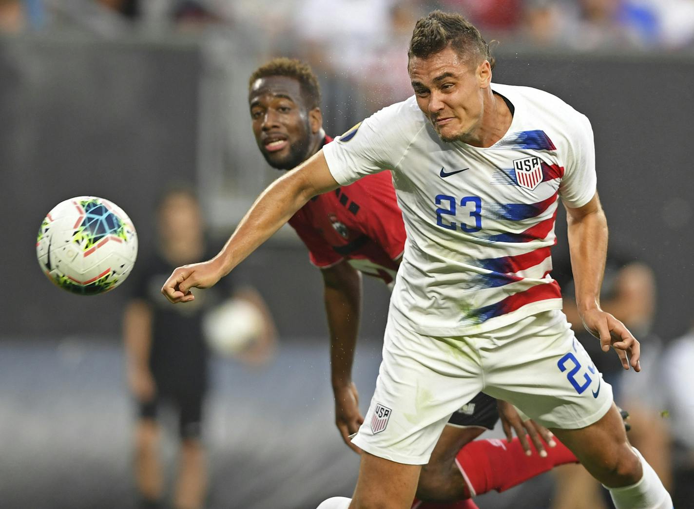 U.S. defender Aaron Long heads the ball in for a goal during the first half of the team's CONCACAF Gold Cup soccer match against Trinidad and Tobago on June 29 in Cleveland. A loss to T&T in 2017 lnocked the U.S. from World Cup play.