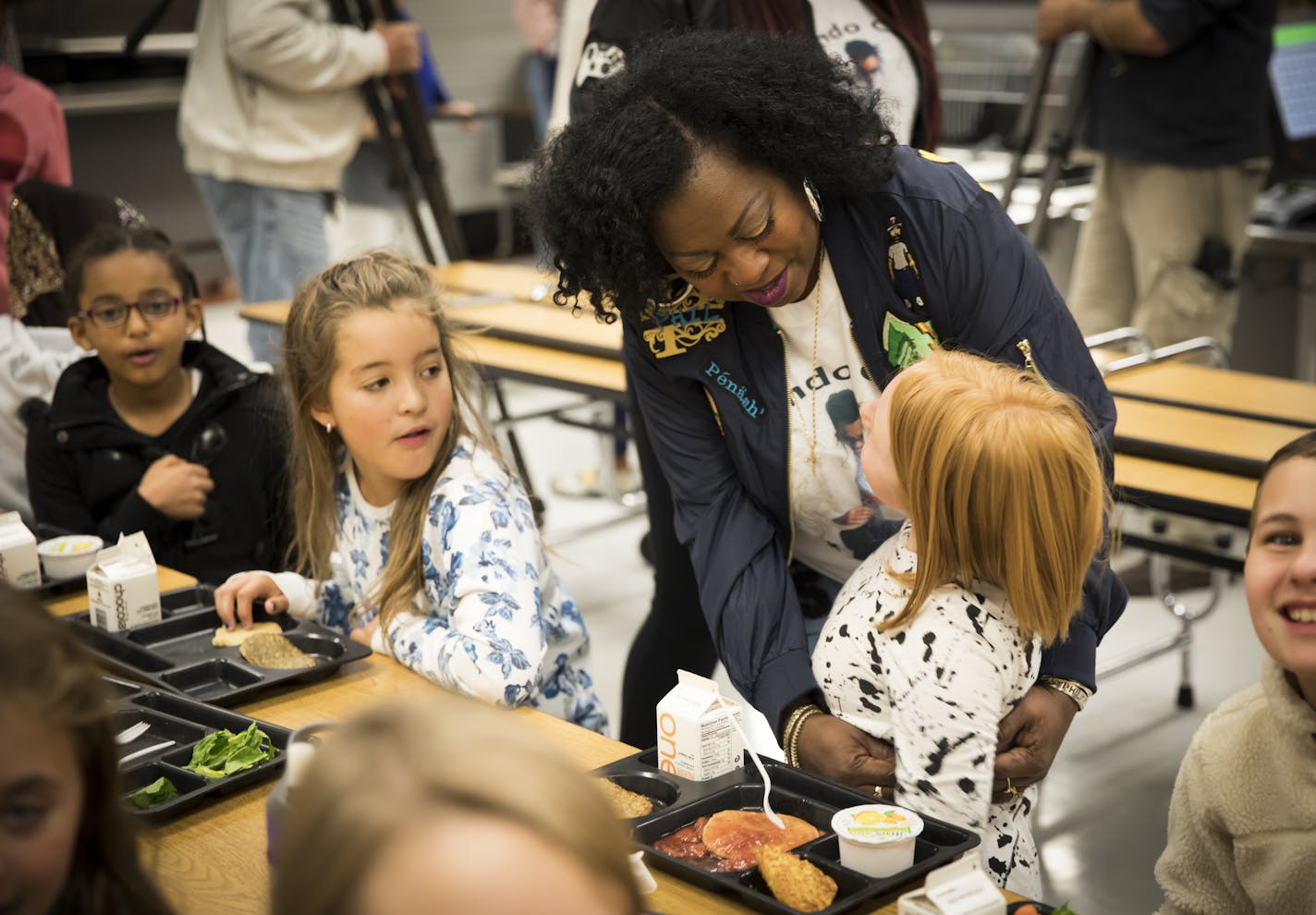 Valerie Castile, mother of Philando Castile, greeted children in the lunchroom he worked at as she arrived for an event to announce a donation of $10,000 from the "Philando Feeds the Children" effort at J.J. Hill Montessori in St. Paul, Minn., on Friday, October 13, 2017. ] RENEE JONES SCHNEIDER &#x2022; renee.jones@startribune.com can't use names