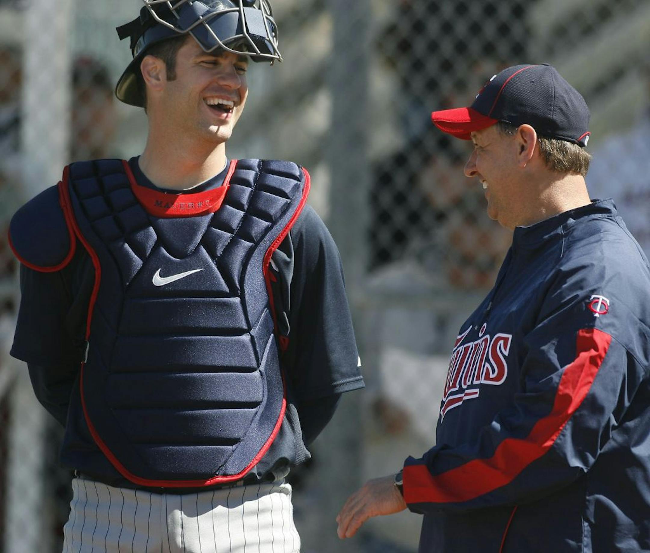 Joe Mauer and Terry Steinbach shared a laugh during last year's Spring Training