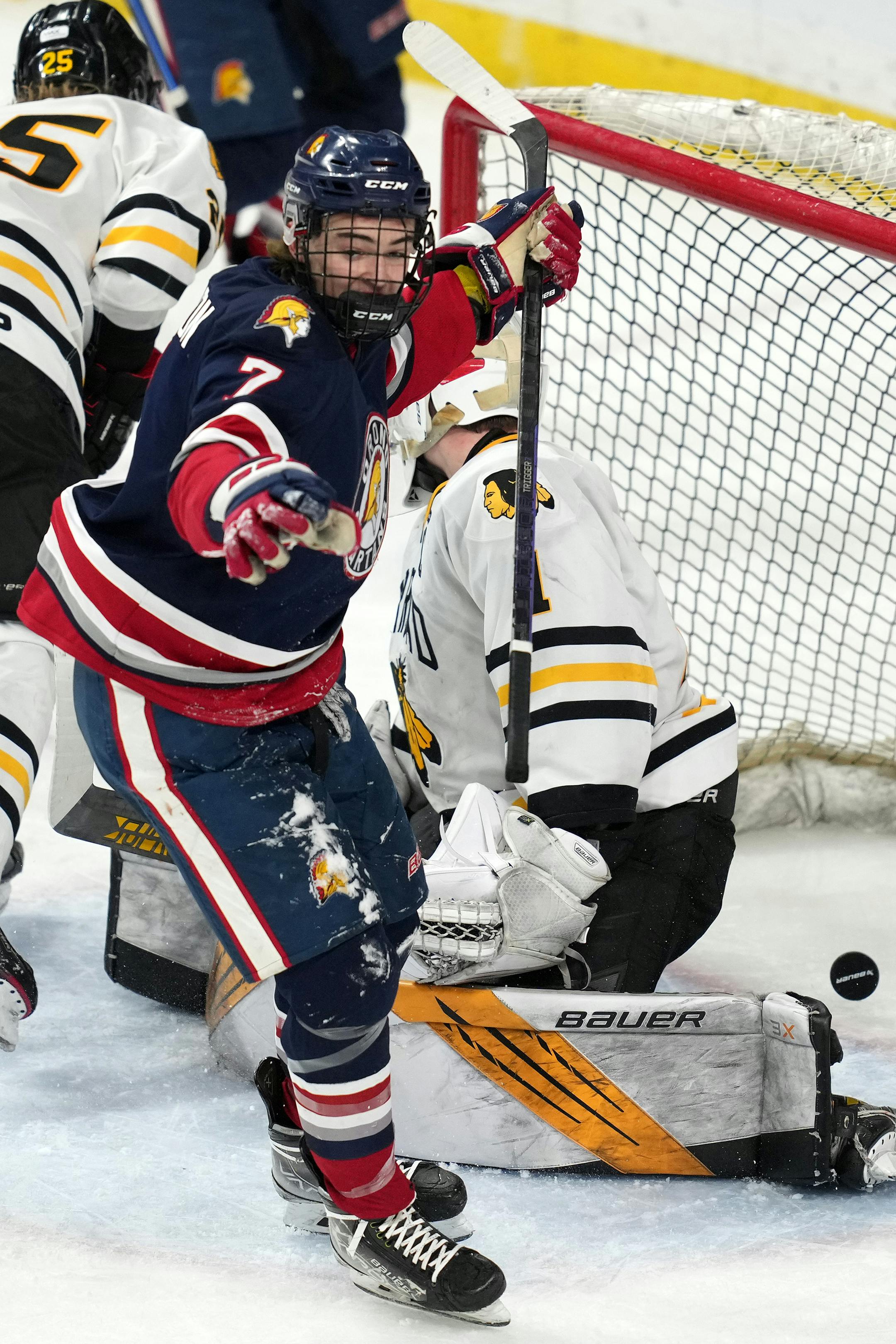Orono forward Avery Anderson (7) celebrates after scoring past Warroad goaltender Hampton Slukynsky (1) in the third period.