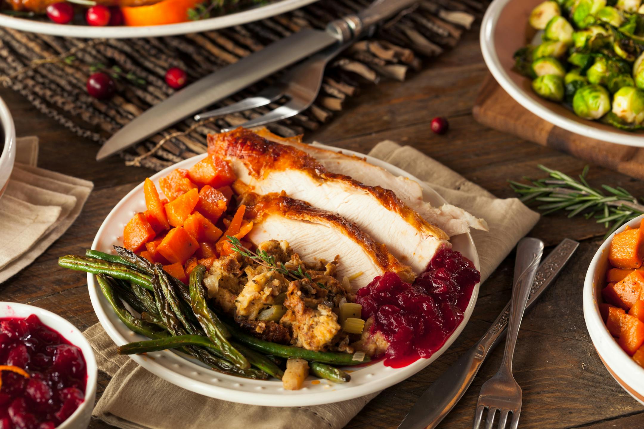 Full Homemade Thanksgiving Dinner with Turkey Stuffing Veggies and Potatos
