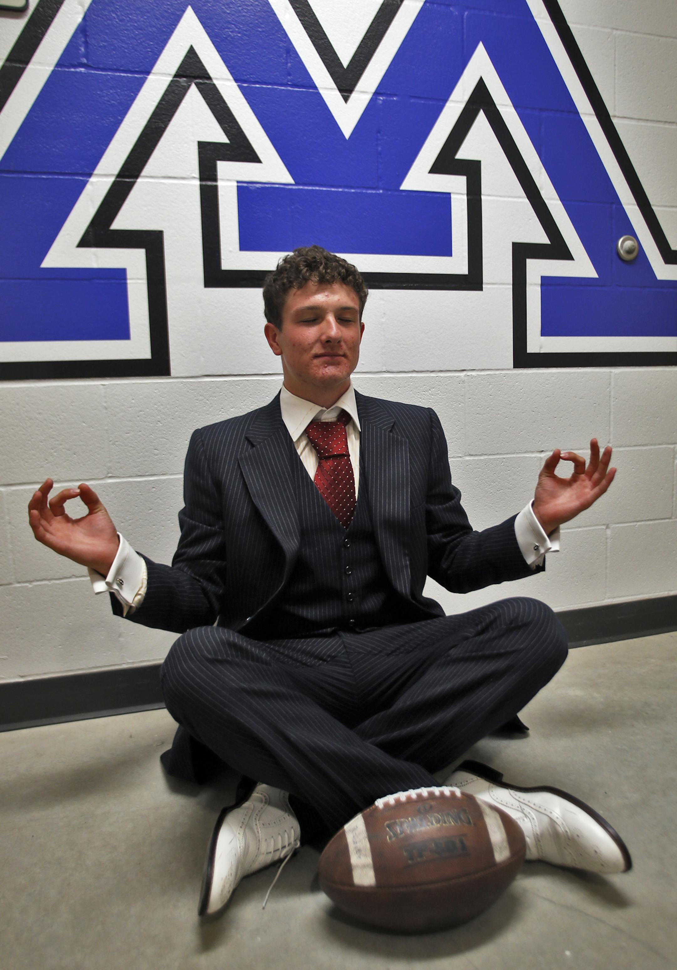 Minnetonka quarterback Nick Rooney wears suits to school to demonstrate his leadership. Rooney practices yoga exercises to get his mind thinking clearly about football. (MARLIN LEVISON/STARTRIBUNE(mlevison@startribune.com)
