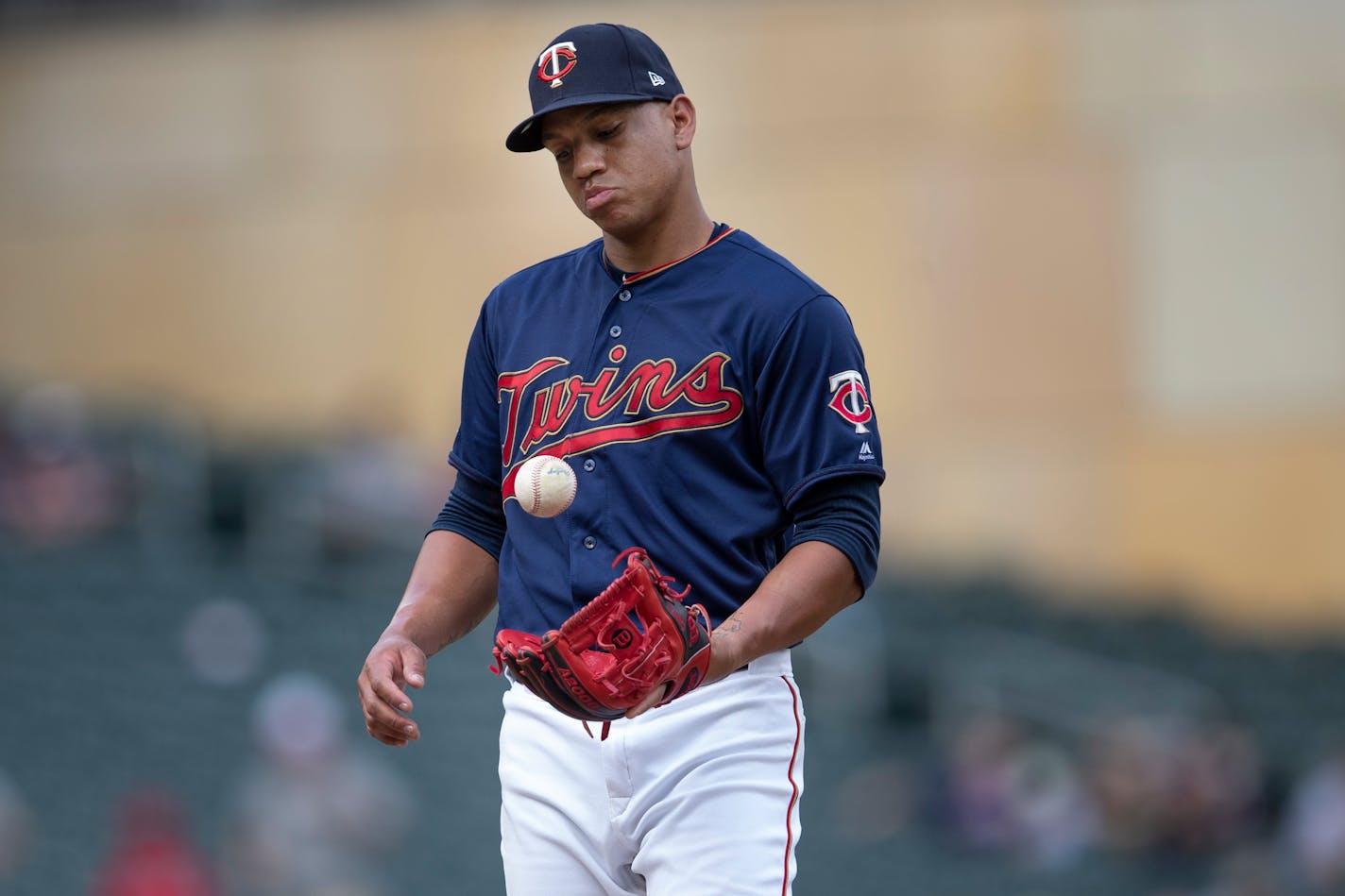 Twins shortstop Ehire Adrianza pitched the ninth inning Wednesday at Target Field