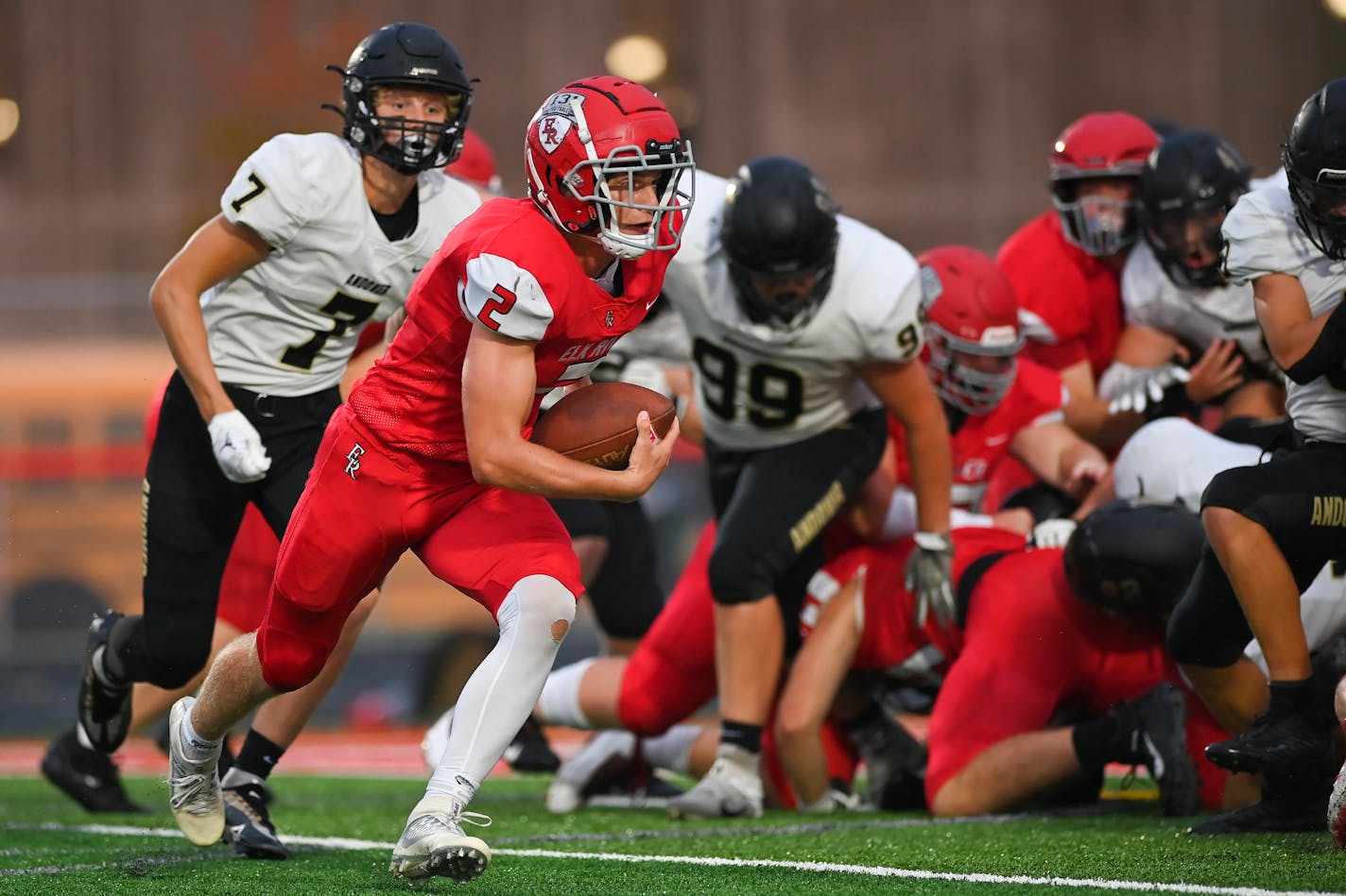 Elk River quarterback Cade Osterman (2) rushes the ball Friday, Sept. 9, 2022 during the first half of a football game at Elk River High School in Elk River, Minn. ] aaron.lavinsky@startribune.com ORG XMIT: MIN2209092039370124