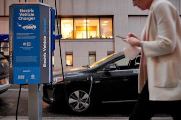 FILE Ñ A public charging station for electric vehicles in New York, March 7, 2022. Hennepin County will focus on a long-term plan to get electric car