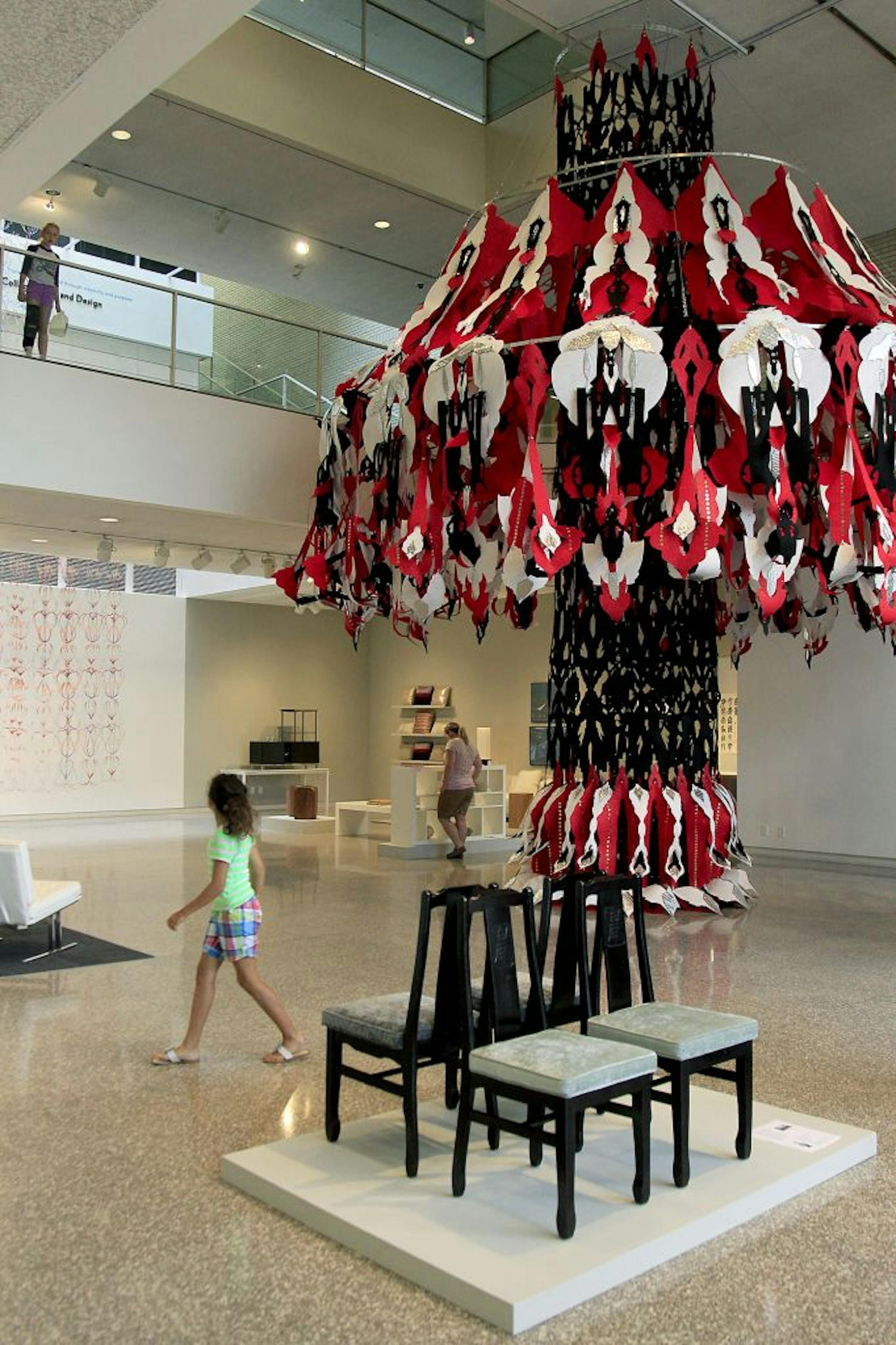 McKnight grant winner Marcus Young is selling his used furniture as part of his search for love, while Liz Miller created a two-story carnival of red, black and white cutouts.