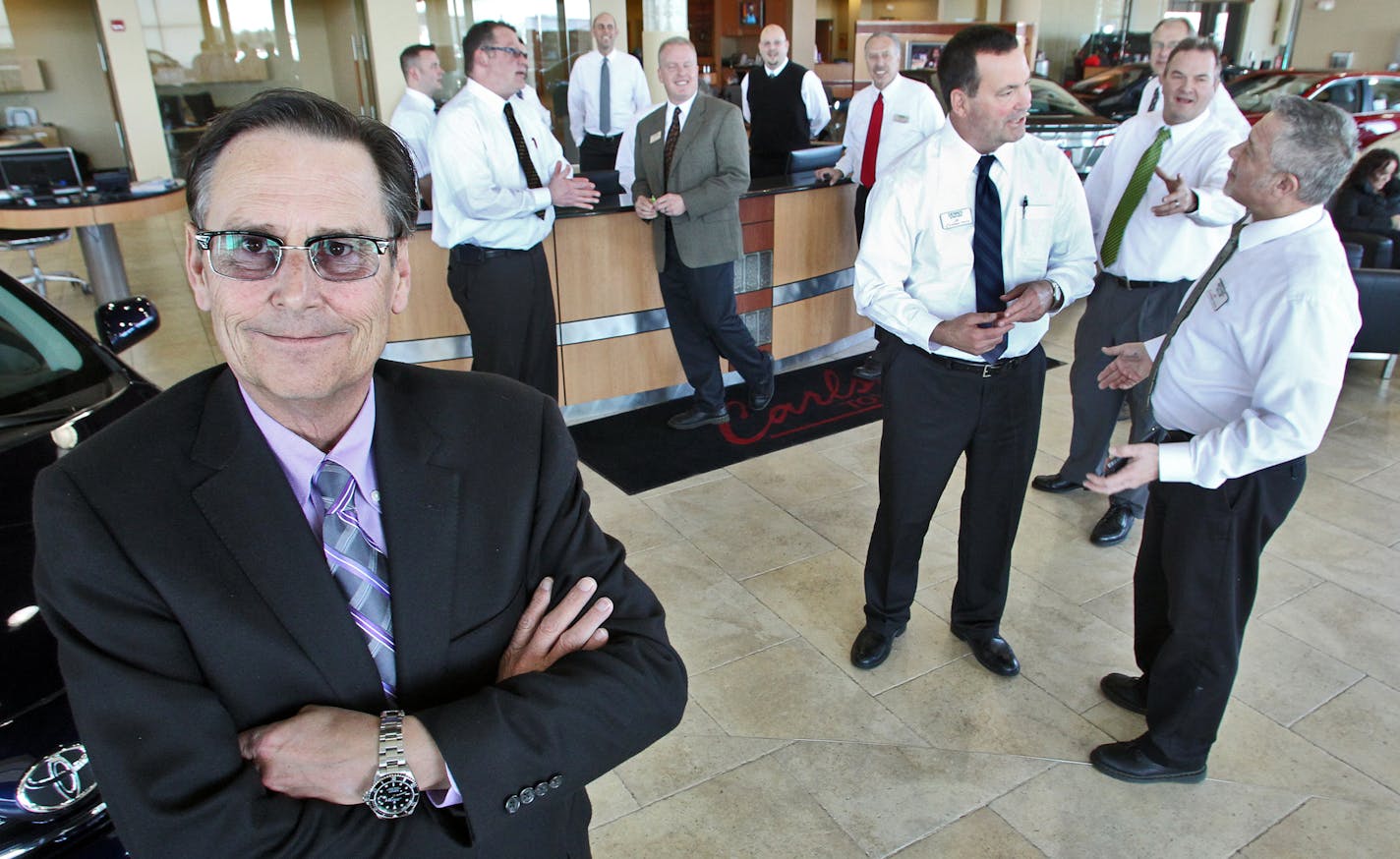 Employment at auto dealers in Minnesota is on the upswing the past year. Curt Folstad, general manager of Toyota in Coon Rapids, left, has many salespeople on his show room floor having hired eight in the past six months. (MARLIN LEVISON/STARTRIBUNE(mlevison@startribune.com (cq Curt Folstad)