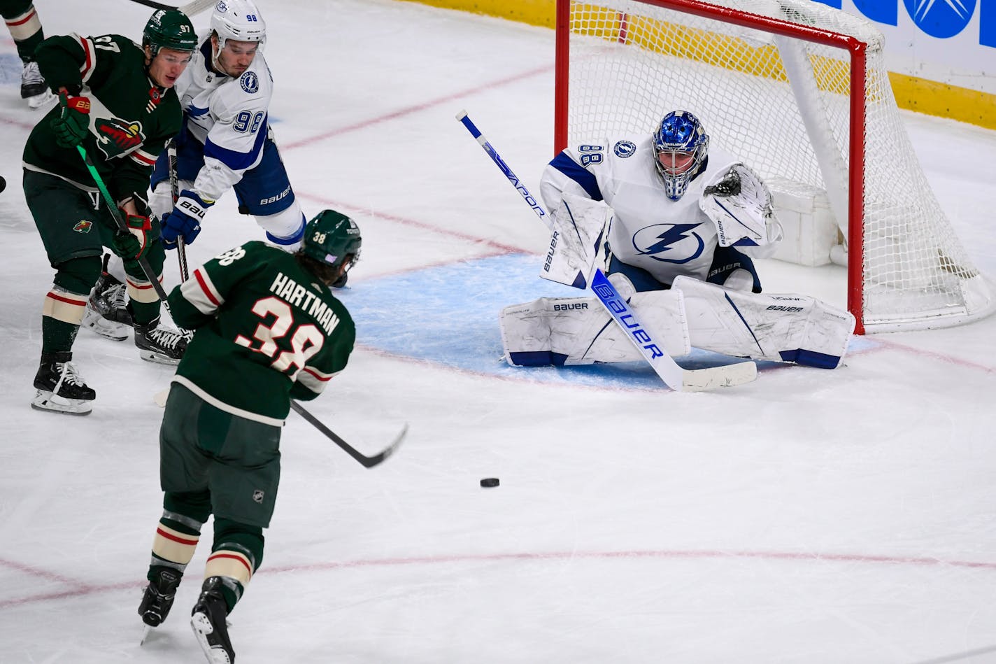 Wild right wing Ryan Hartman scores the go-ahead goal past Tampa Bay goalie Andrei Vasilevskiy on Sunday afternoon in St. Paul.