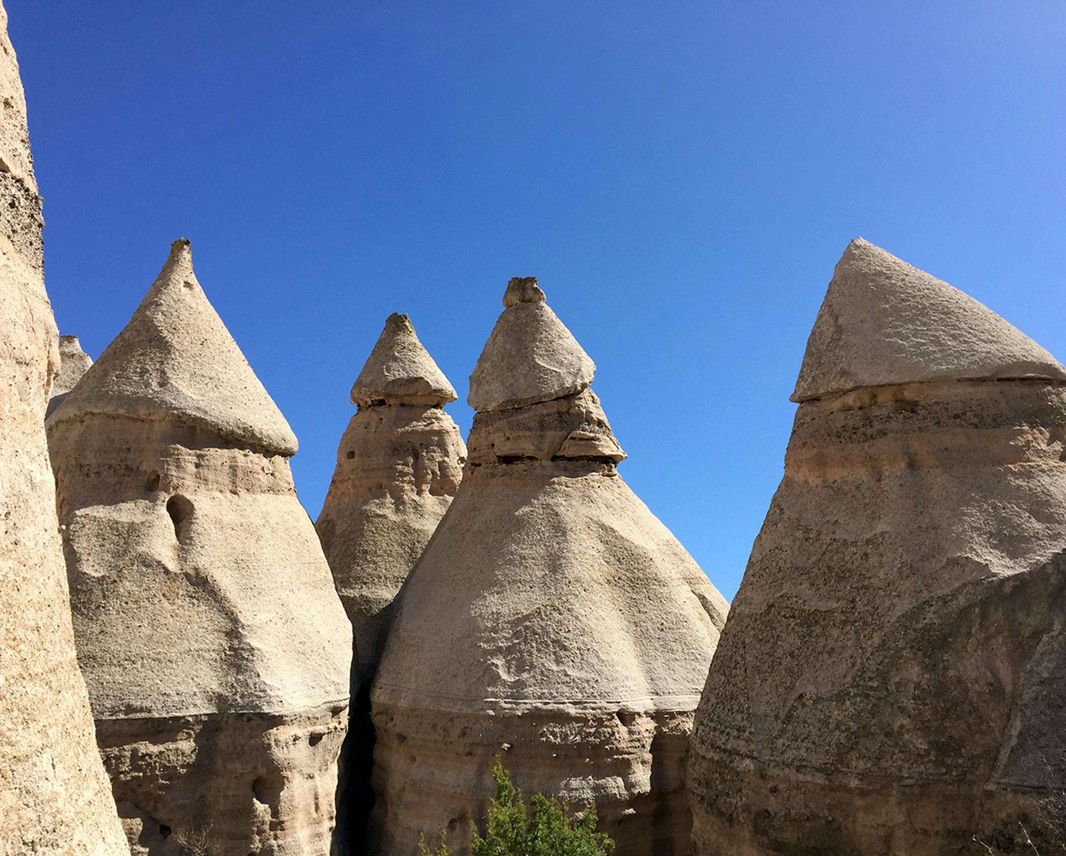 Can I have your name as you would like it to appear in print, and the town in which you live?
Lucy Morrissey
Eden Prairie Where were you when you took this photo? Kasha-Katuwe Tent Rocks National Monument in northern New Mexico. This photo was on the Canyon Trail hike up towards the top of the mesa. What does it show?
This photo shows some of the tops of the ìtent rocksî - volcanic rock deposited 6-7 million years ago during eruptions in the Jemez Mountains. The geologic name for this