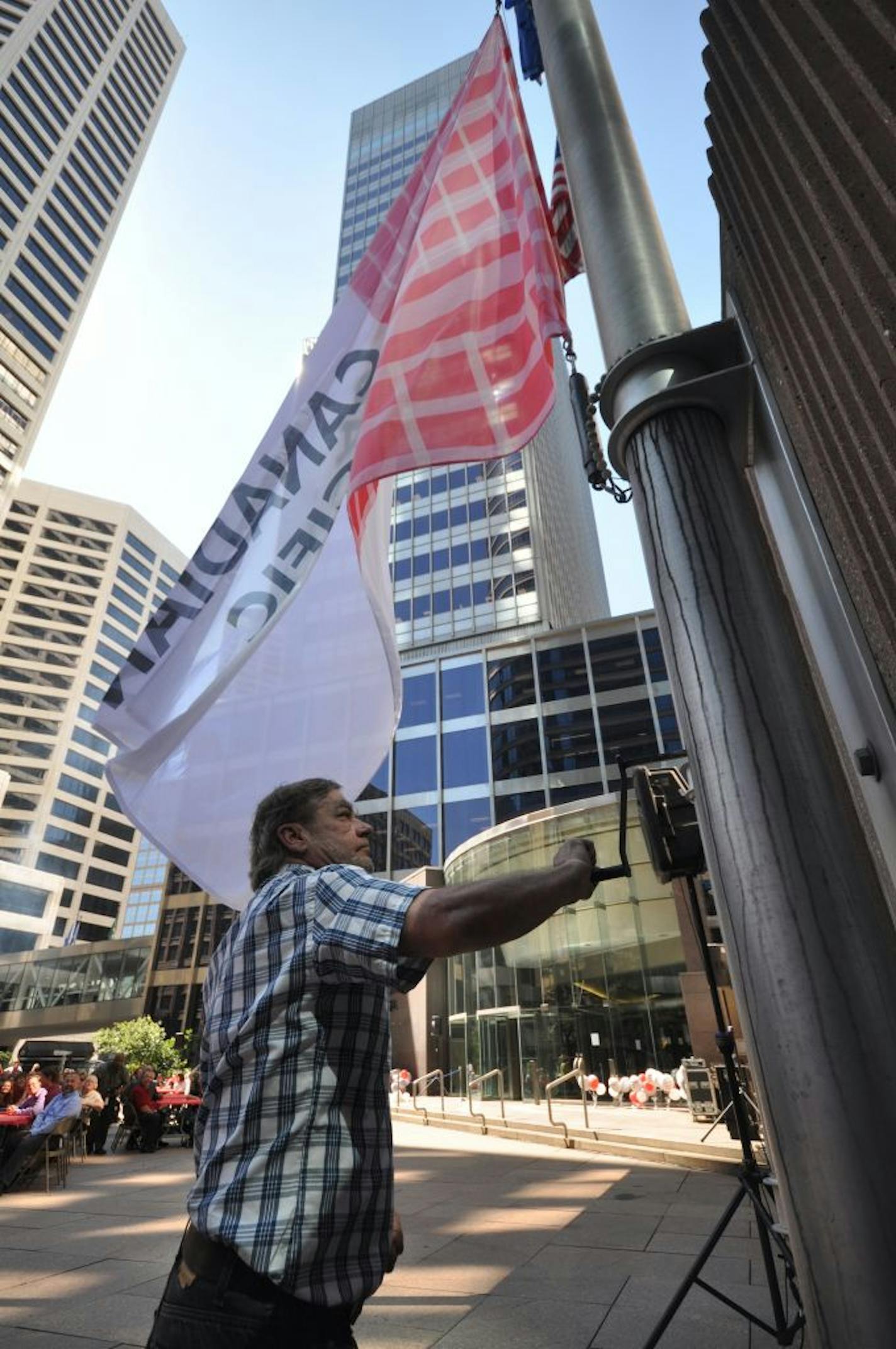 Michael Leonard, a 46-year employee with Canadian Pacific and predecessor railroads, raised the company flag (on Aug. 20) at what is now Canadian Pacific Plaza, the former One Financial Plaza in downtown Minneapolis. Canadian Pacific, which employs 1,600 throughout Minnesota, has moved its 400 headquarters employees from the Soo Line Building, which is being converted to housing.