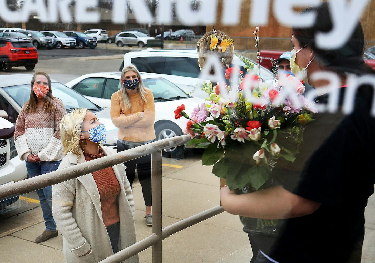 Helping Hands of Alexandria volunteers and organizers said goodbye to CentraCare dialysis staff members after delivering gift cards, flowers and sweets to front-line workers. Among the volunteers was former dialysis center patient Sarah Busche.