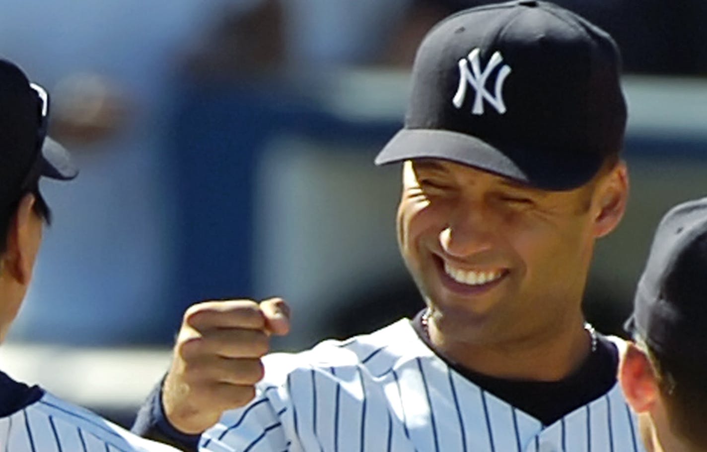 New York Yankees Derek Jeter celebrates with Hideki Matsui (55) and Bubba Crosby, right, after beating the Toronto Blue Jays, 6-2, Thursday, Aug. 25, 2005, at Yankee Stadium in New York. (AP Photo/Bill Kostroun) ORG XMIT: NYY105