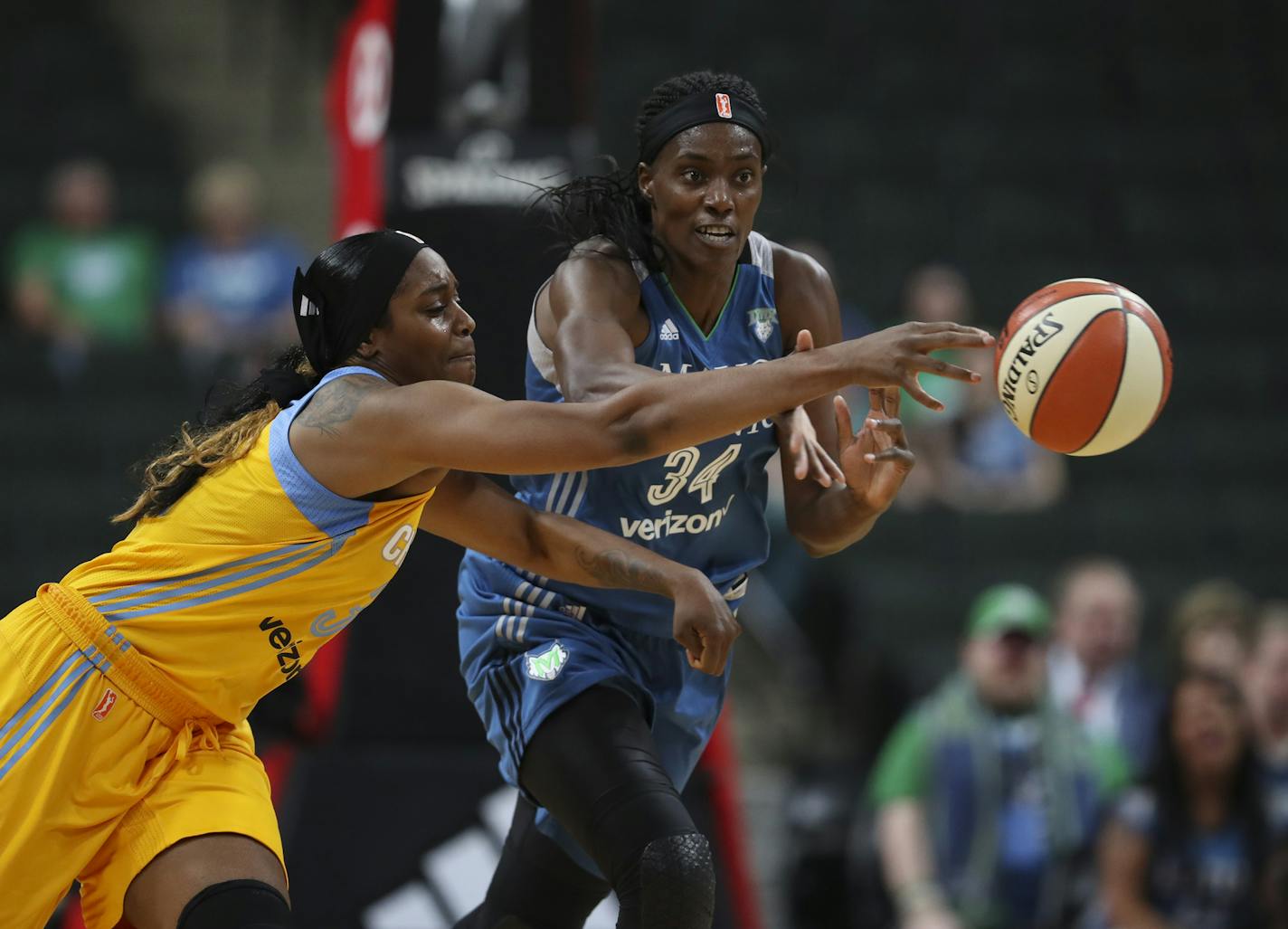 Lynx center Sylvia Fowles, right, and Sky forward Cheyenne Parker chased after a loose ball in the first quarter of Sunday&#x2019;s WNBA opener at Xcel Energy Center.