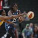 Lynx center Sylvia Fowles, right, and Sky forward Cheyenne Parker chased after a loose ball in the first quarter of Sunday&#x2019;s WNBA opener at Xce