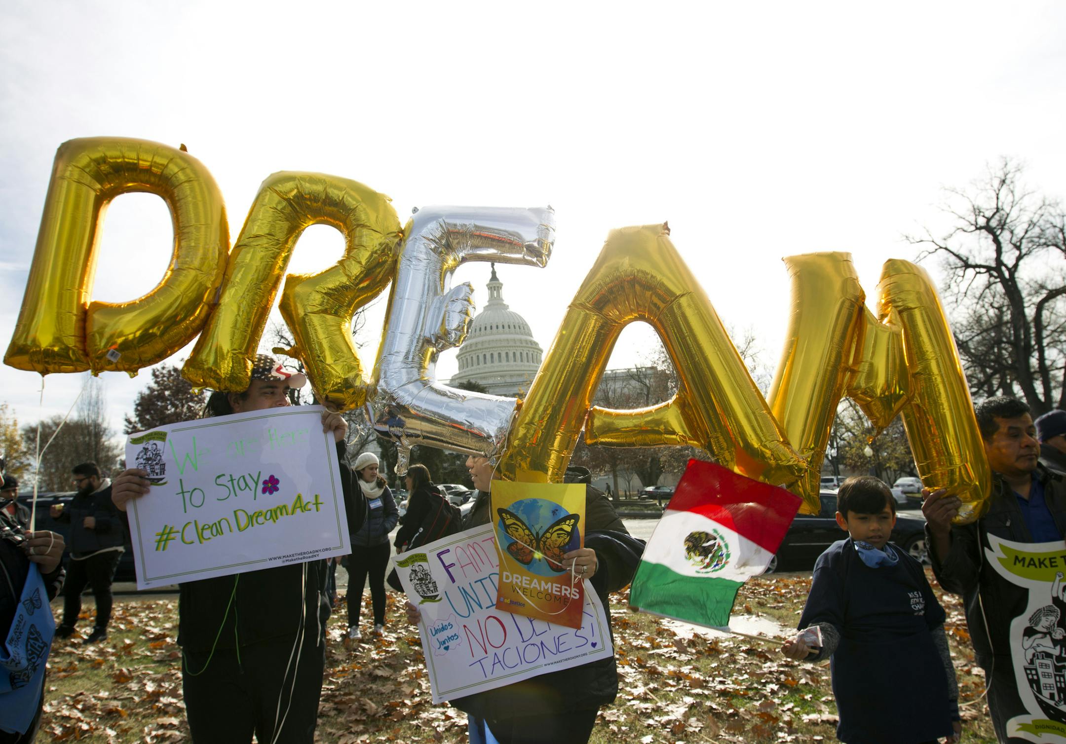 Demonstrators hold up balloons during an immigration rally in support of the Deferred Action for Childhood Arrivals (DACA), and Temporary Protected Status (TPS), programs, near the U.S. Capitol in Washington, Wednesday, Dec. 6, 2017. ( AP Photo/Jose Luis Magana)