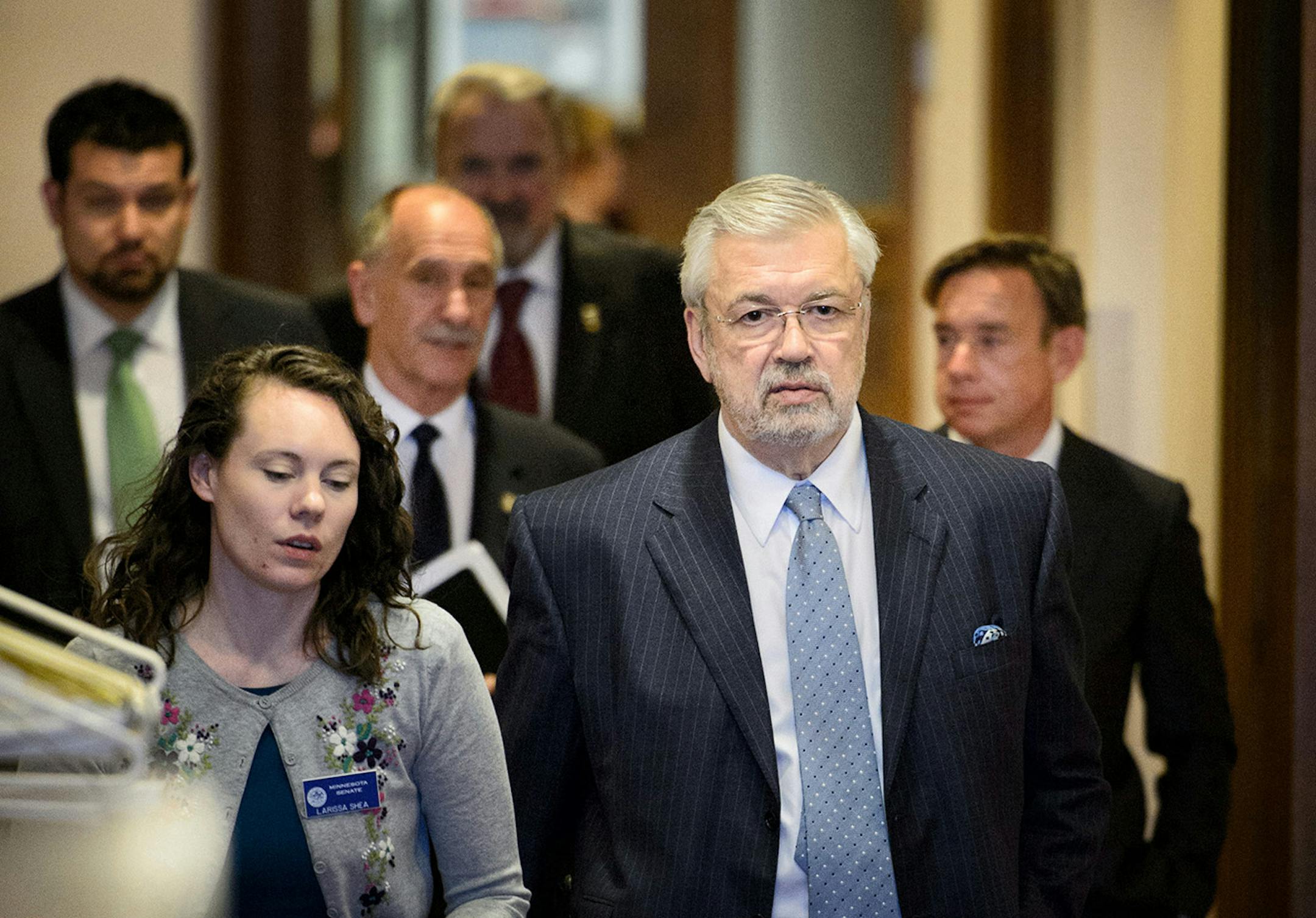 Dr. Bill McGuire heads to the State Capitol, Tuesday, April 14, 2015, to pitch his stadium plan to lawmakers including Senate Majority Leader Tom Bakk and House Speaker Kurt Daudt.