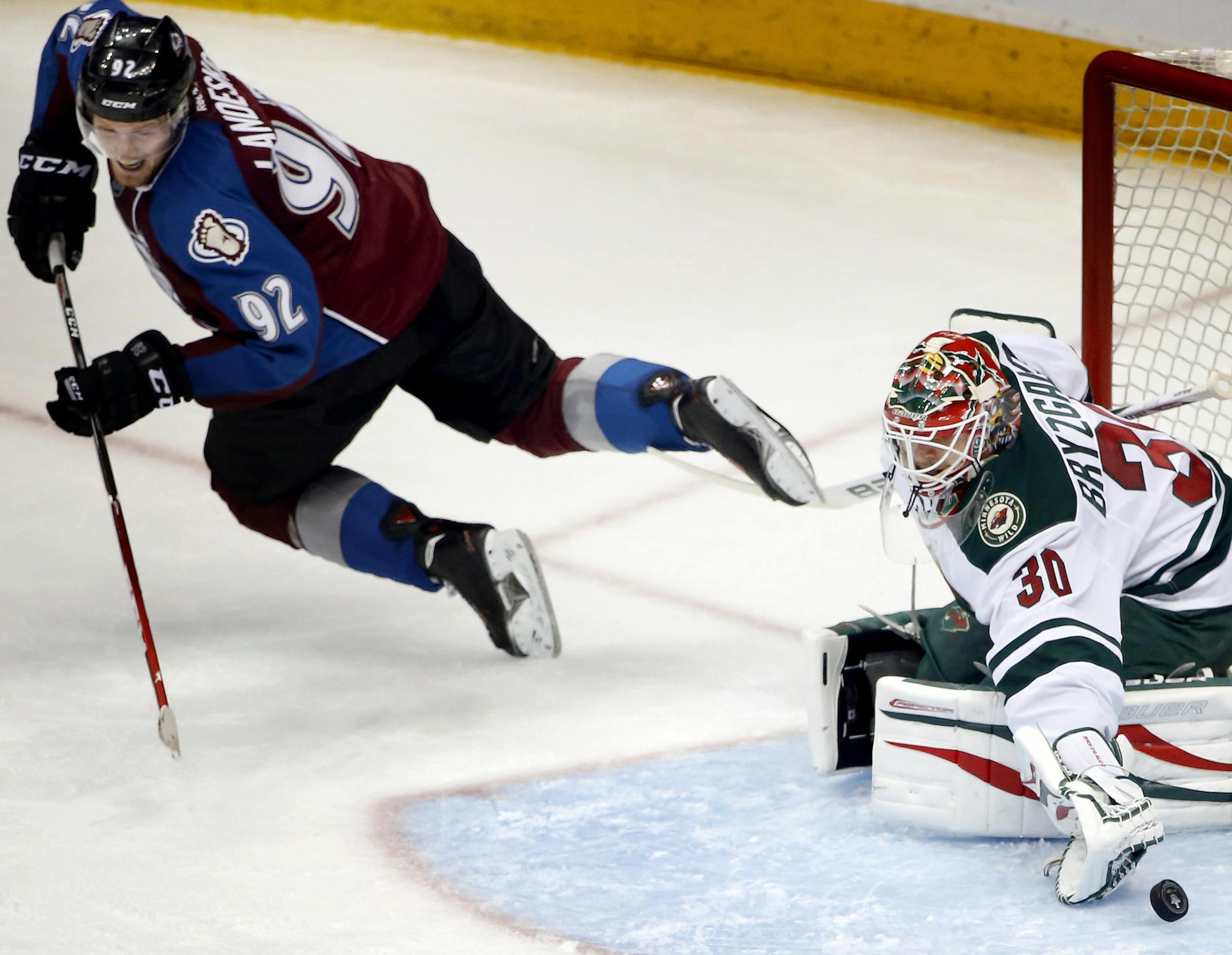 Minnesota Wild goalie Ilya Bryzgalov (30) made a save against Gabriel Landeskog (92) in the second period. ] CARLOS GONZALEZ cgonzalez@startribune.com - April 17, 2014, Denver, Colorado, Pepsi Center, NHL, Minnesota Wild vs. Colorado Avalanche, Stanley Cup Playoffs round 1, Game 1