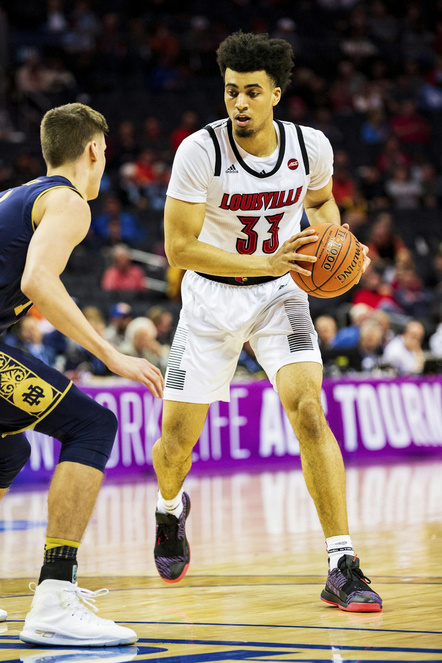 Louisville Cardinals forward Jordan Nwora (33) during the ACC College Basketball Tournament game between the Notre Dame Fighting Irish and the Louisville Cardinals at the Spectrum Center on Wednesday March 13, 2019 in Charlotte, NC. Jacob Kupferman/CSM(Credit Image: &copy; Jacob Kupferman/CSM via ZUMA Wire) (Cal Sport Media via AP Images) ORG XMIT: CSMAP