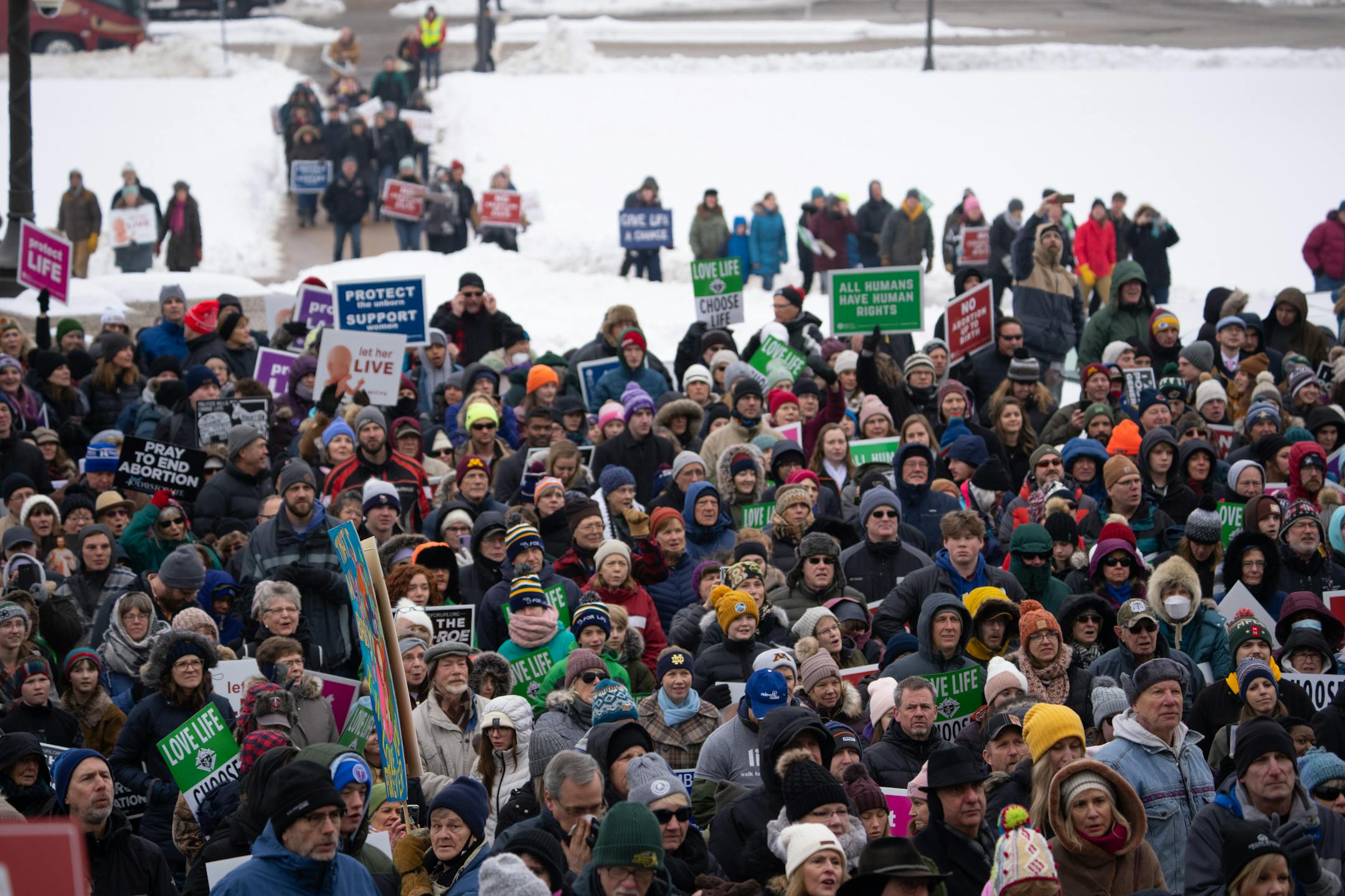 The crowd marched assembled on the grounds of the State Capitol for the March for Life rally.  Minnesota Citizens Concerned for Life hosted a 50th March for Life and the first since Roe was overturned at the State Capitol.