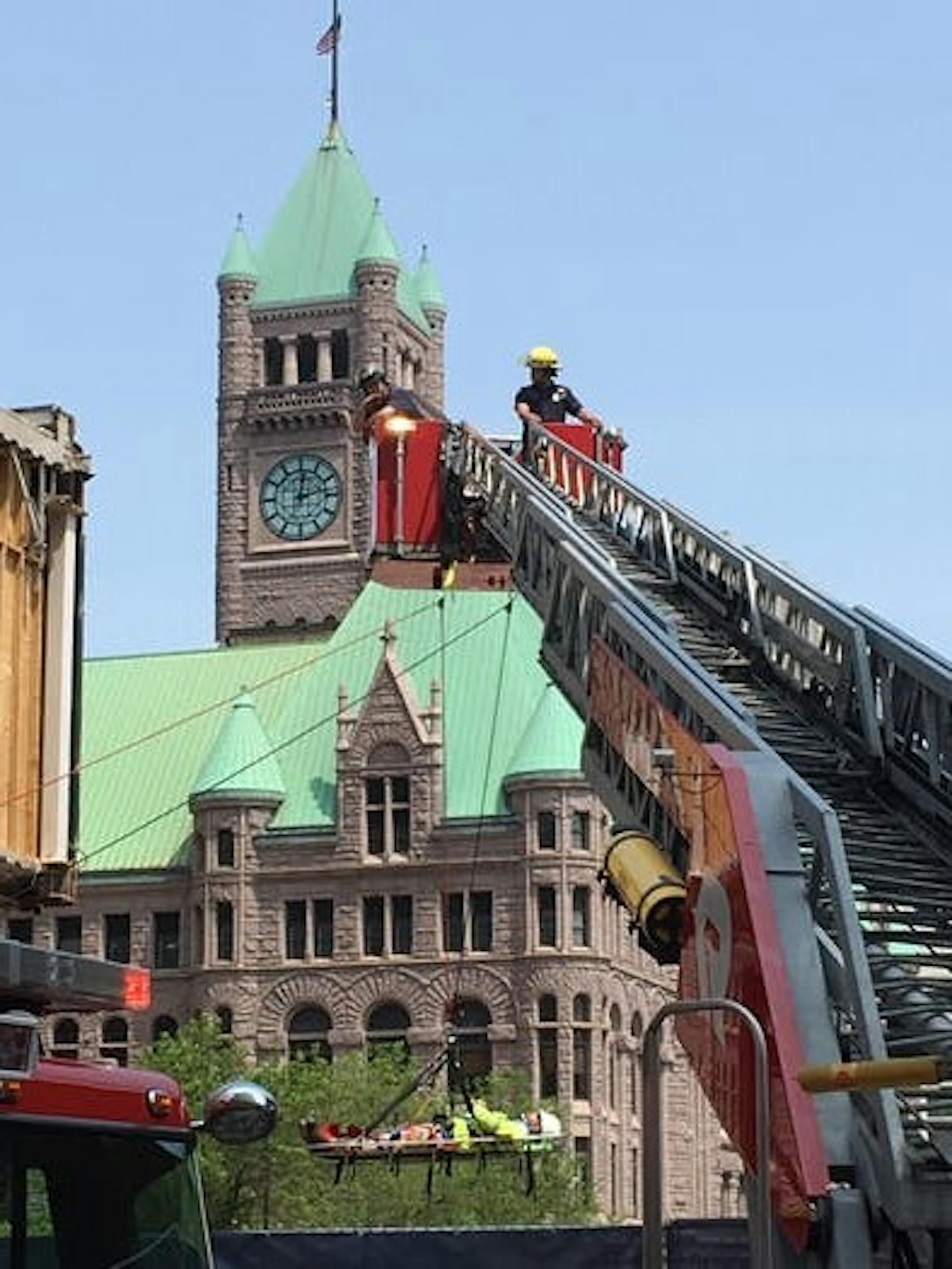 Minneapolis fire crews rescue an injured construction worker in downtown Minneapolis.