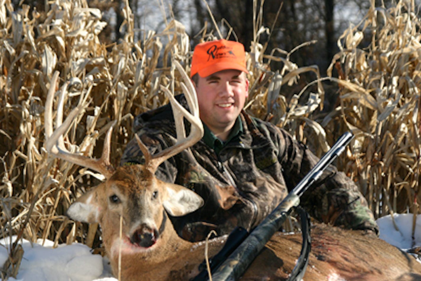 Author Ron Hustvedt with the largest buck of his hunting career